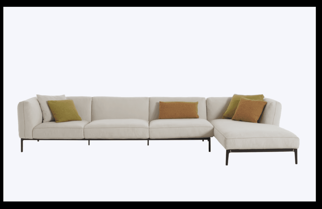 Ivory sectional with sleek lines and plush accents.