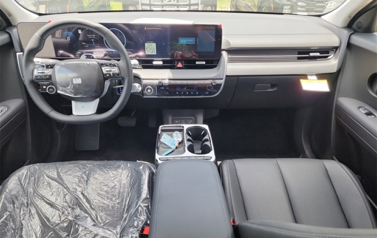 a close up of a steering wheel and dashboard of a car