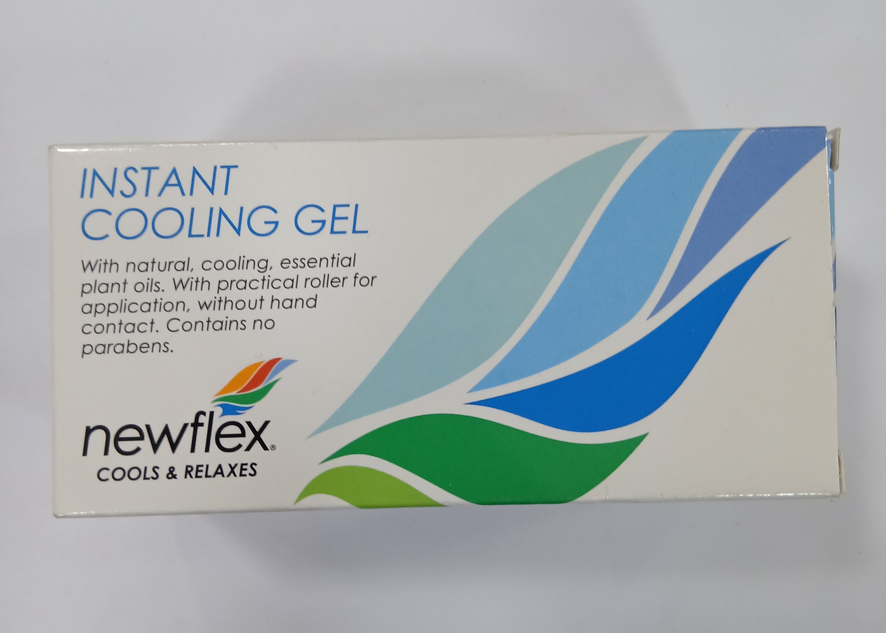 White cardboard packaging displays a blue and green wave design with text advertising an instant cooling gel product containing natural essential plant oils and a practical roller applicator.