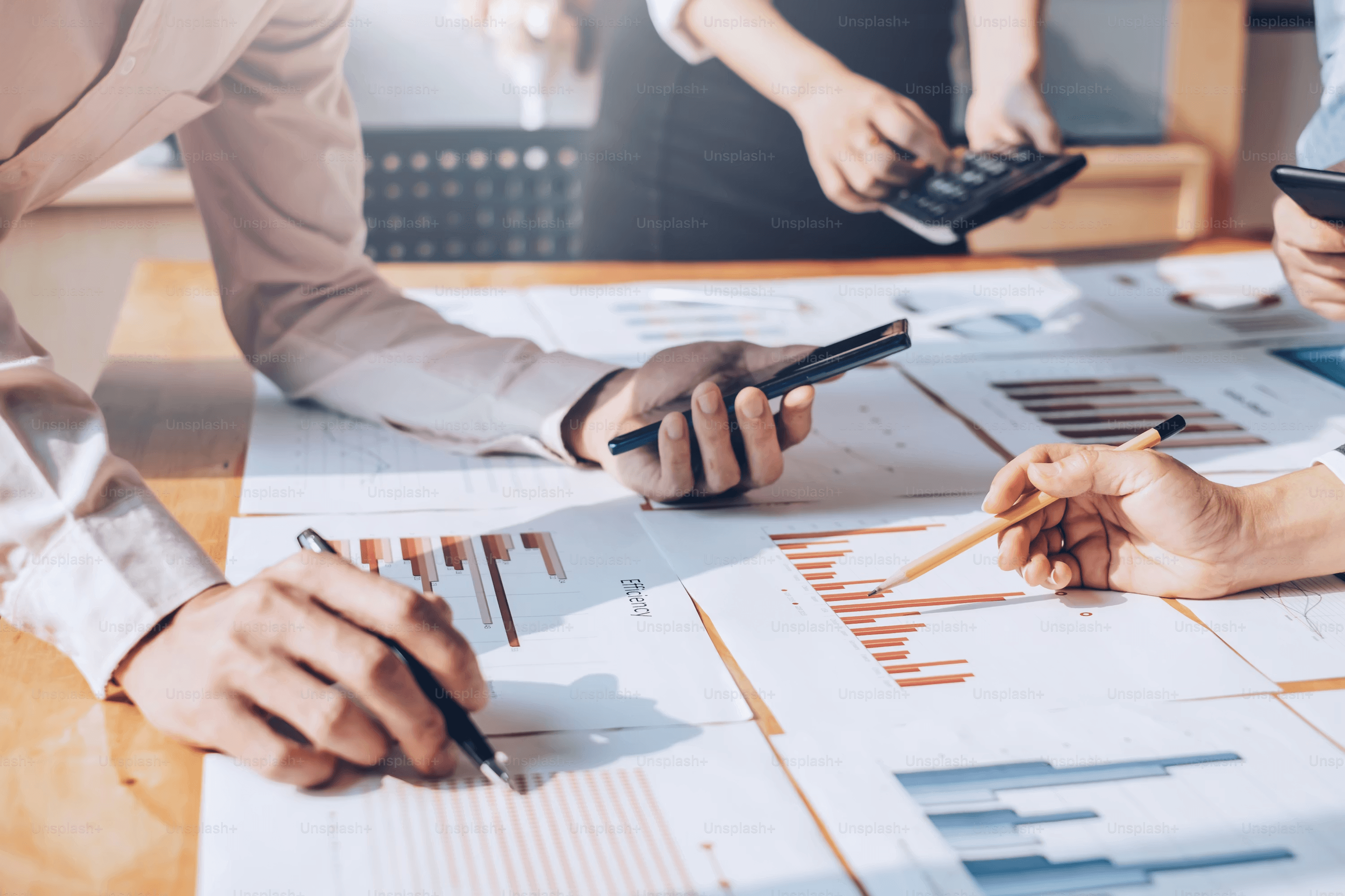 High school student designing a research survey on a laptop with academic notes and data charts nearby