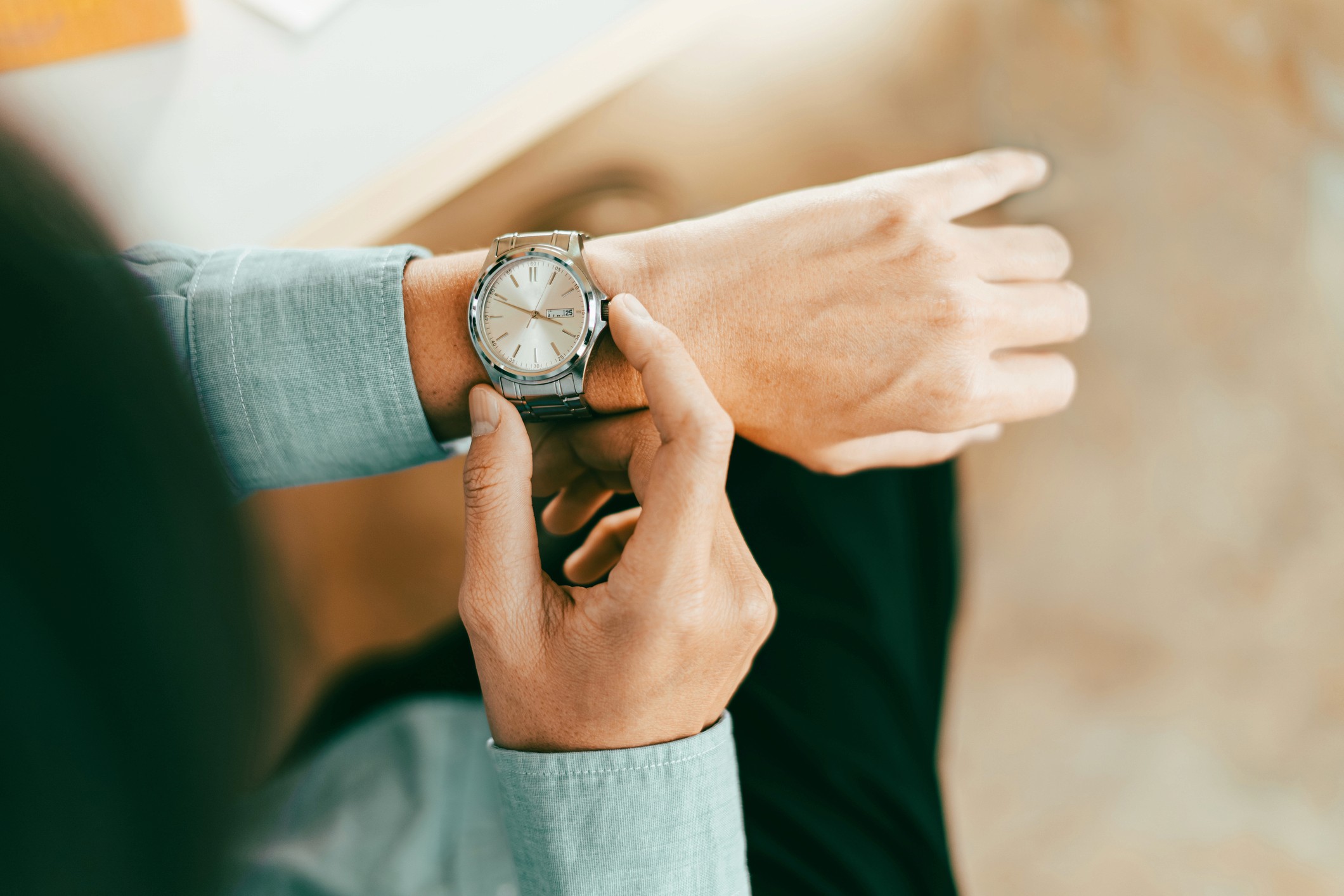 A woman looking at her watch