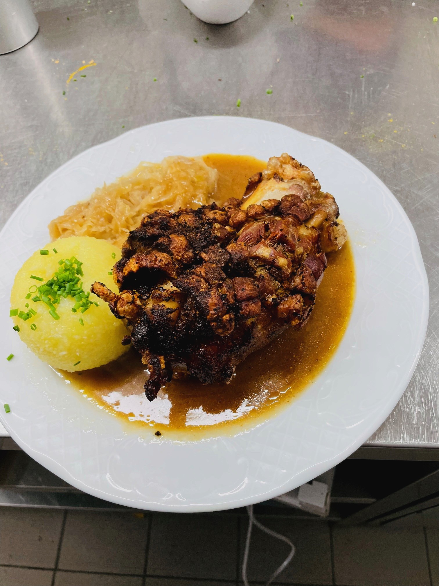 Close-up of a tree stump showing growth rings and a textured brown wood surface.