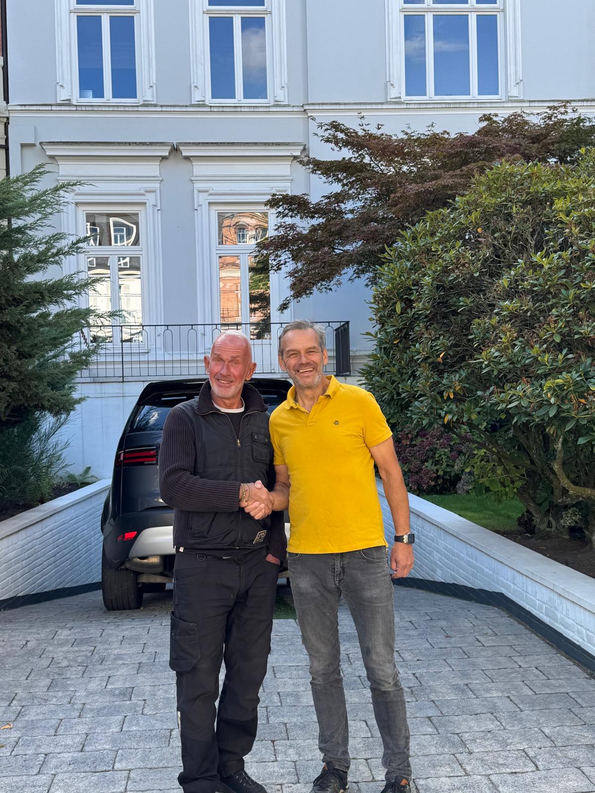 Close-up of a tree stump showing growth rings and a textured brown wood surface.