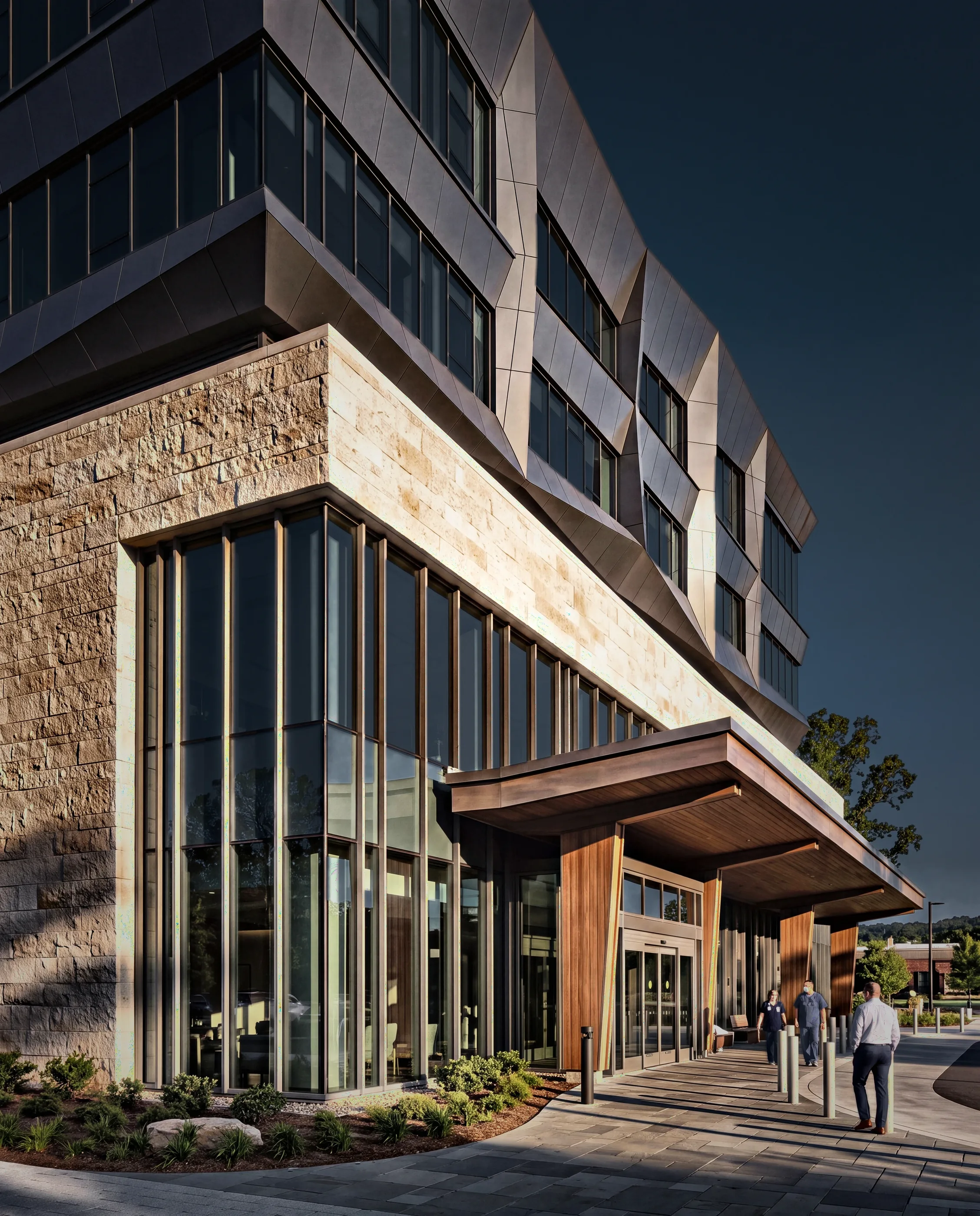 Green roof over a glass facade