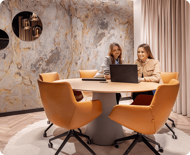The Shire people working in meeting room