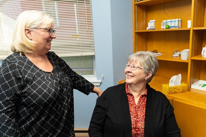 A p[atient receiving treatment from a team member