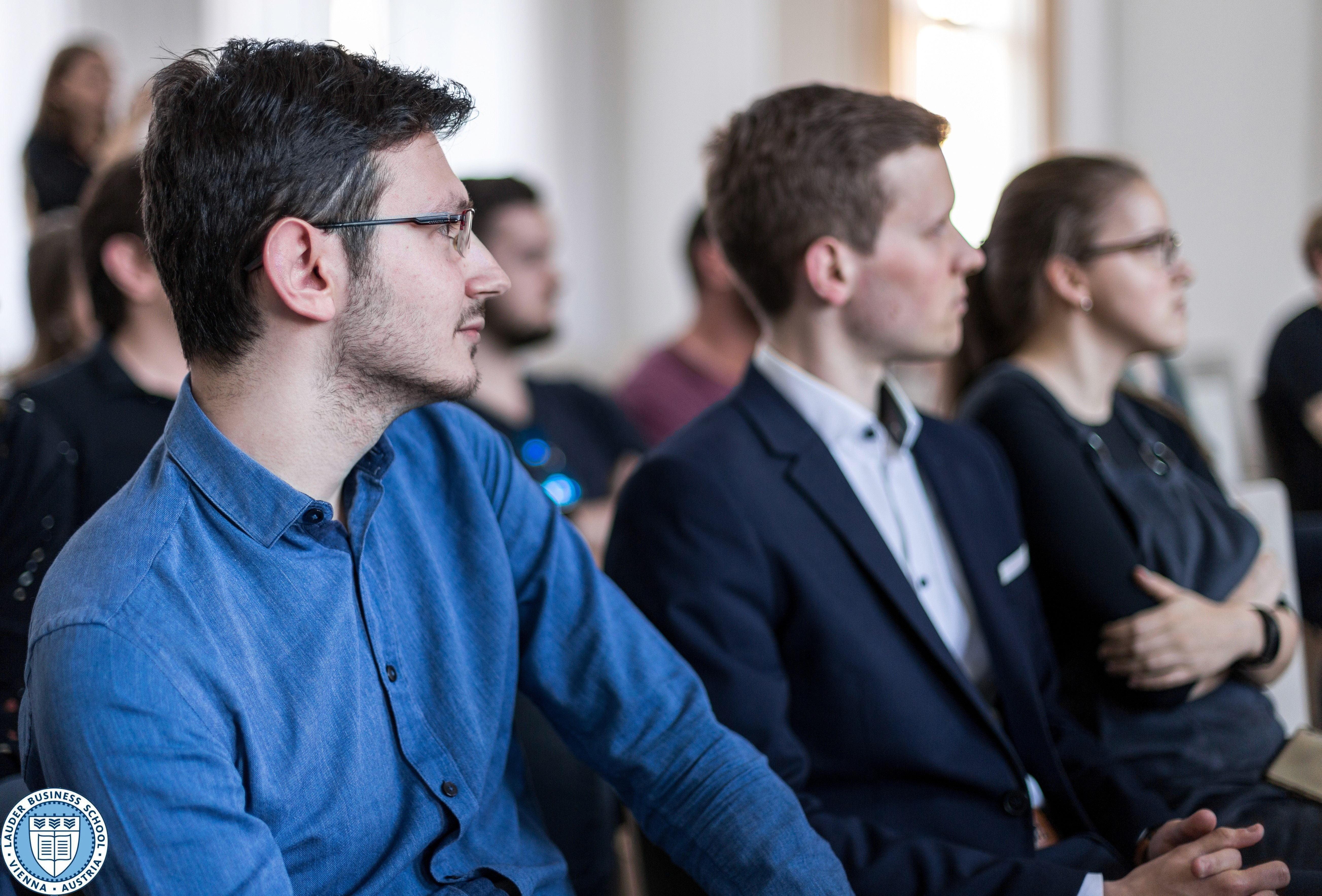 LBS students listneing to Dr. Florian Koschat, the CEO of Pallas Capital Advisory AG 