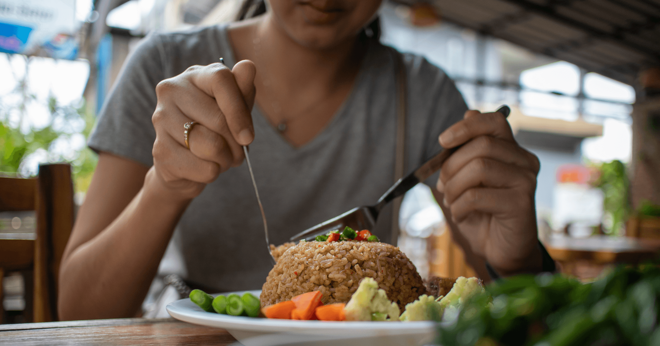 Woman eating vegan meal after mass