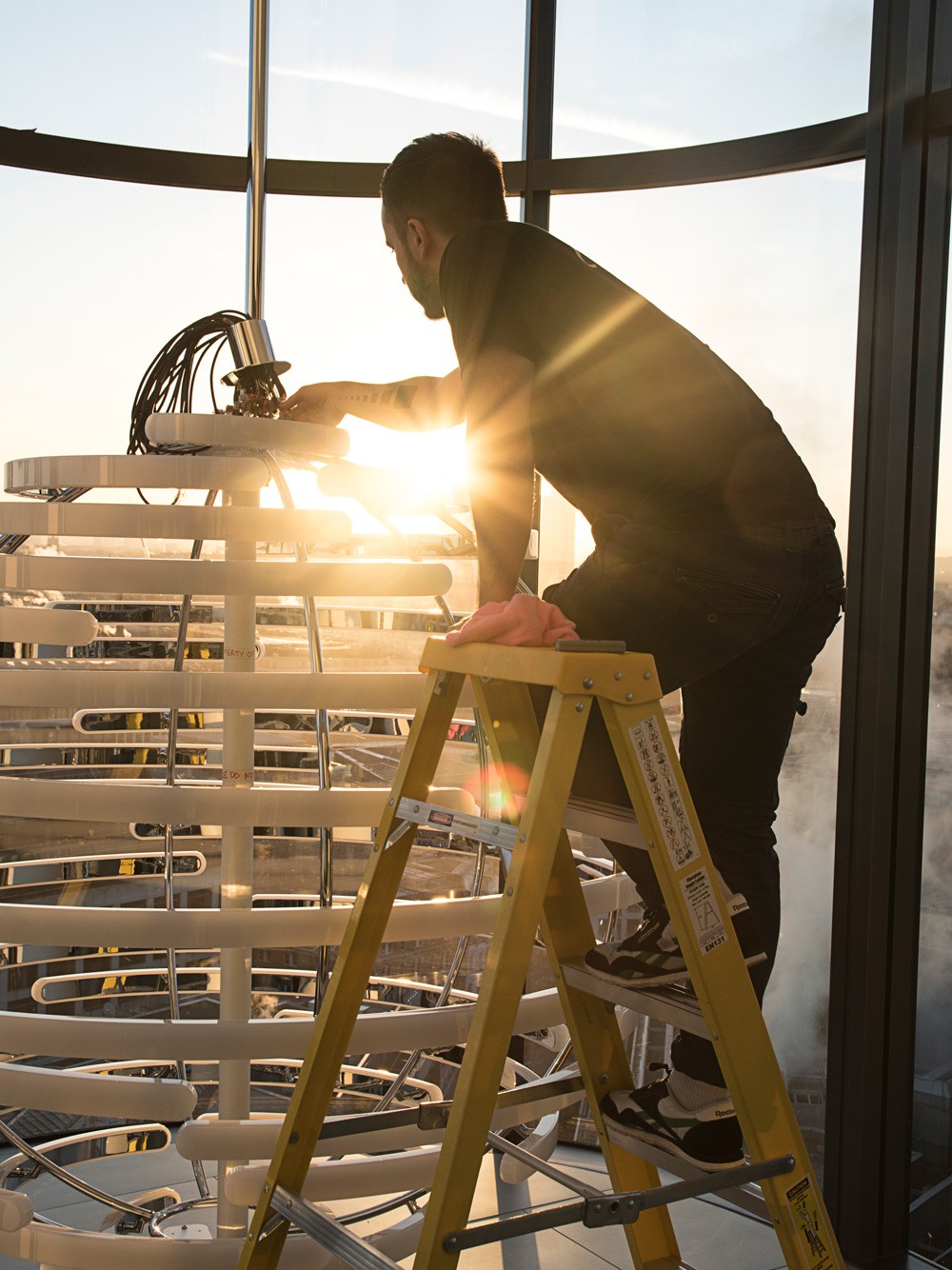 Deloitte Orb lighting installation in the lobby of Deloitte's UK headquarters, serving as a visual statement integrating materiality and lighting technology