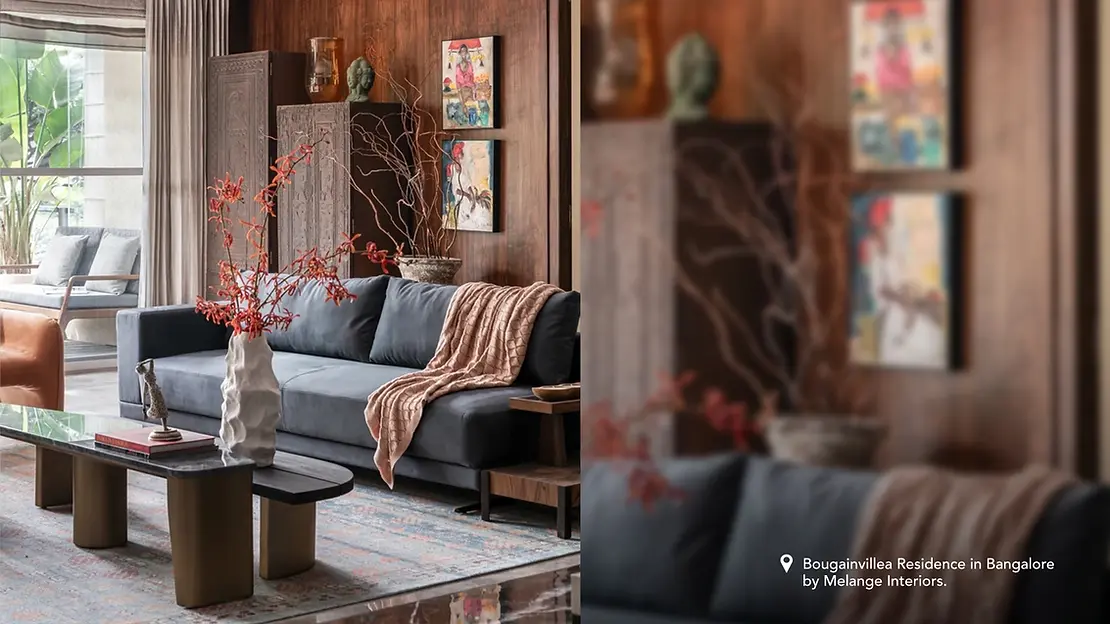 Image of a natural-toned living room interior design style, featuring wooden furniture and a large window.