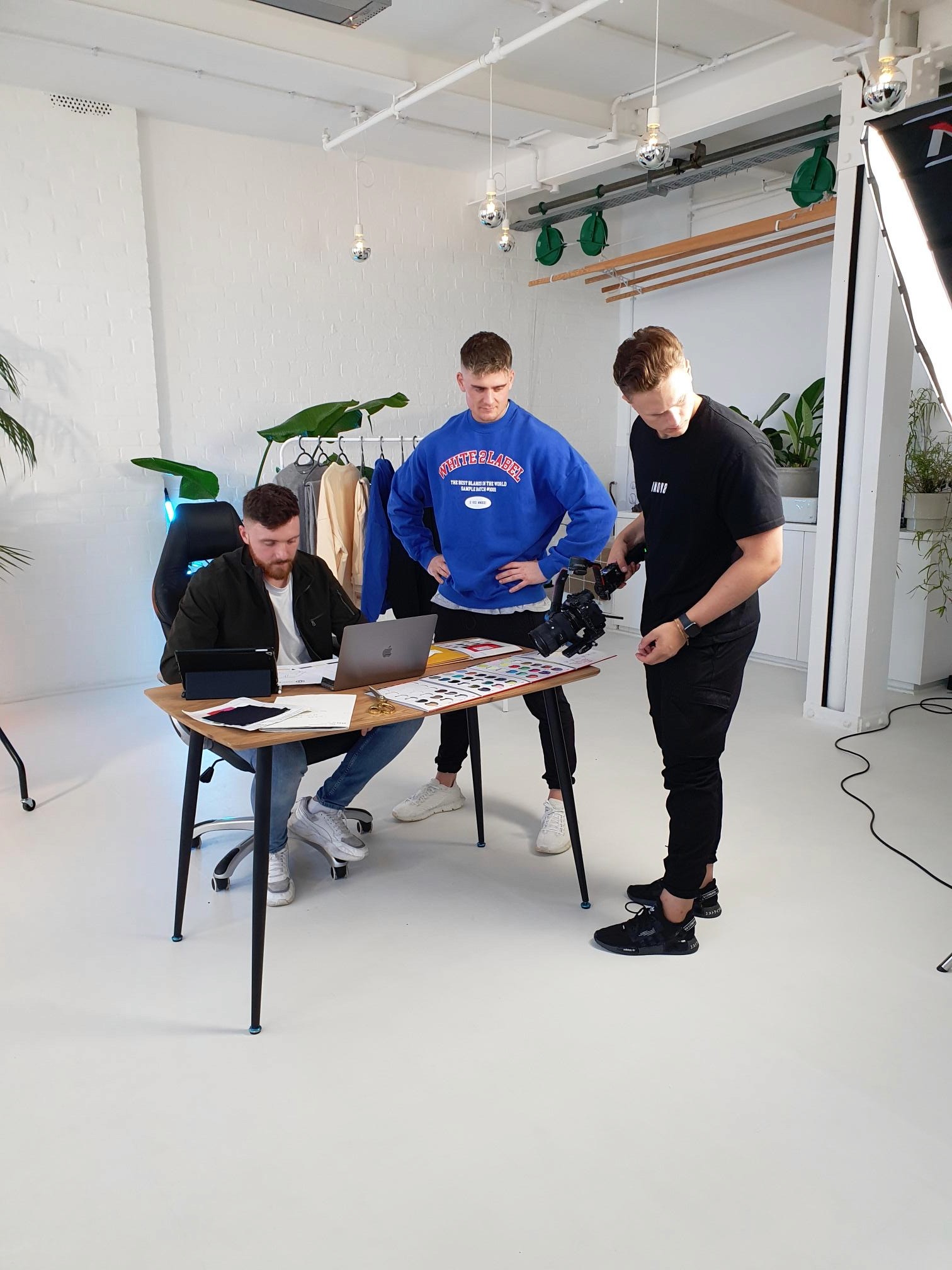 man in blue dress shirt beside man in white dress shirt