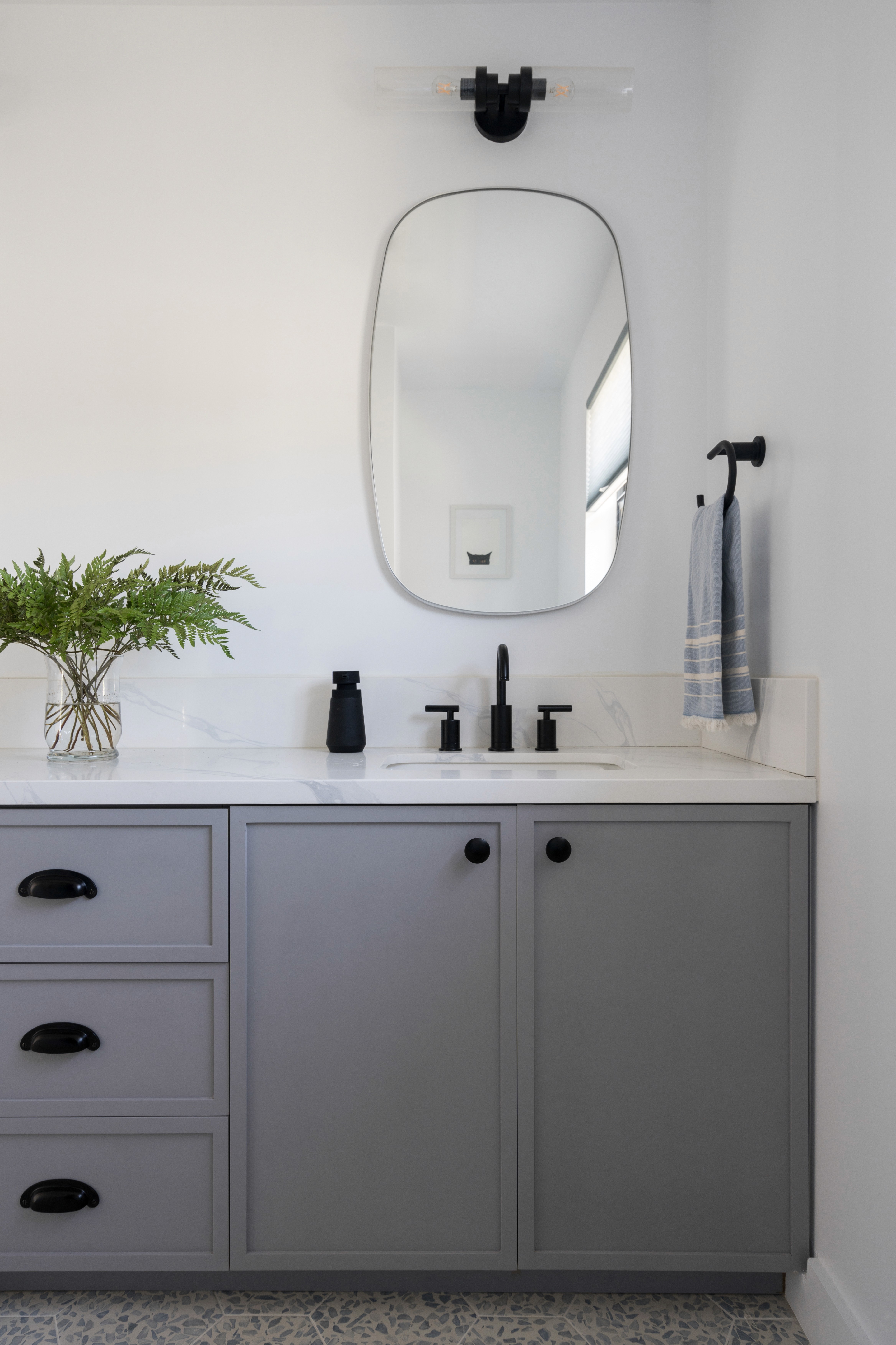 A calm and soothing space with blue accents creating a serene and playful environment by Jubilee Interiors in Lakewood, California