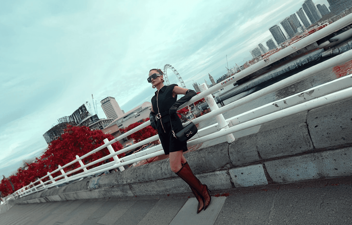 Woman hugging Shiba Inu dog, both looking at camera
