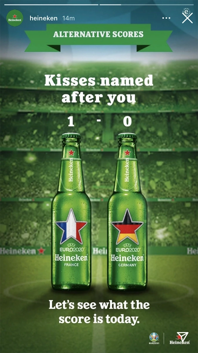 Heineken UEFA Euro 2020 Instagram Story showing 'Alternative Scores' campaign with France and Germany branded Heineken bottles displayed as football scoreboard with humorous 'Kisses named after you 1-0' headline on stadium background
