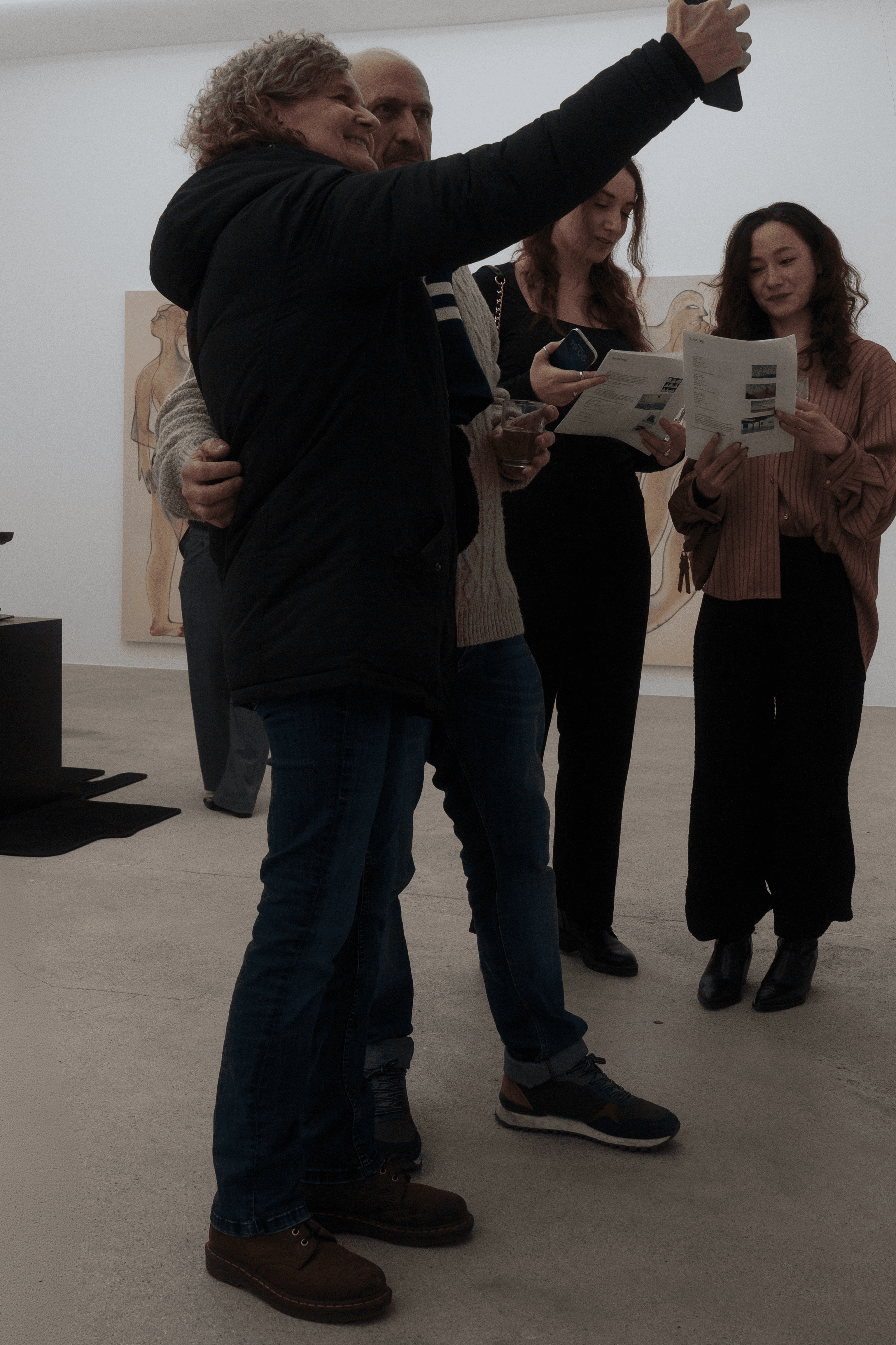 Entrepreneurs engaging in a lively discussion during a Bizz Buzz networking event.