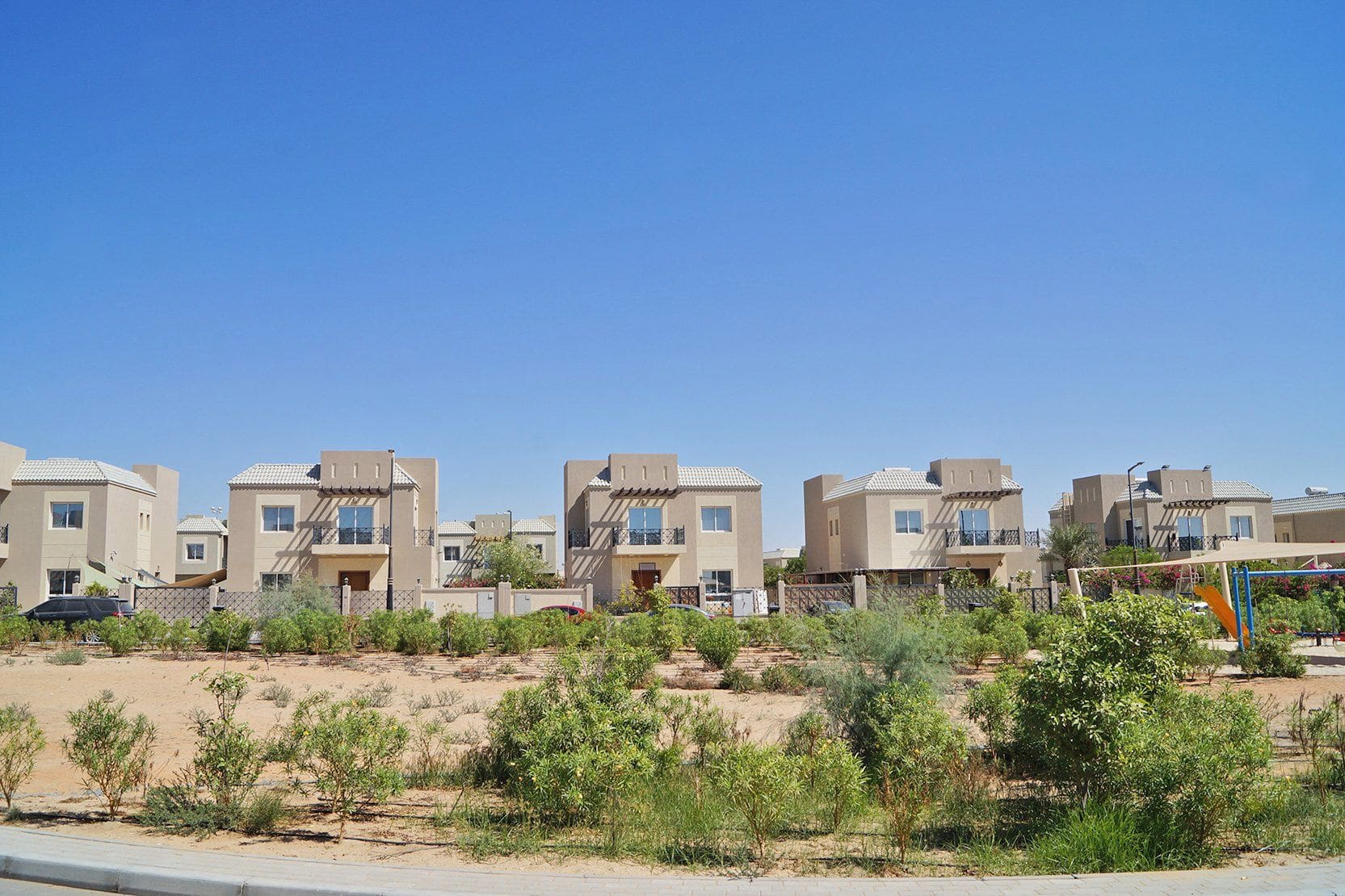 Row of elegant villas in Living Legends. Premium real estate listings and investment opportunities in Dubai.