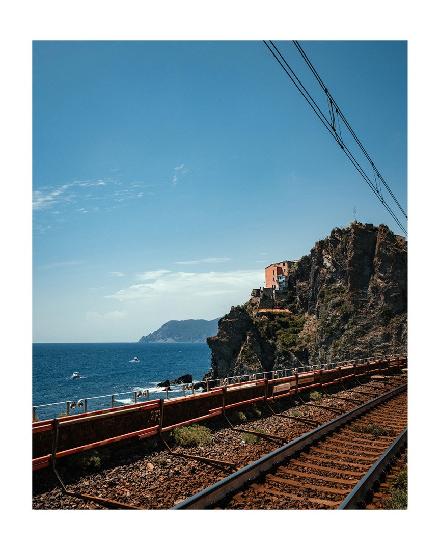 Rail tracks with ocean view Photography