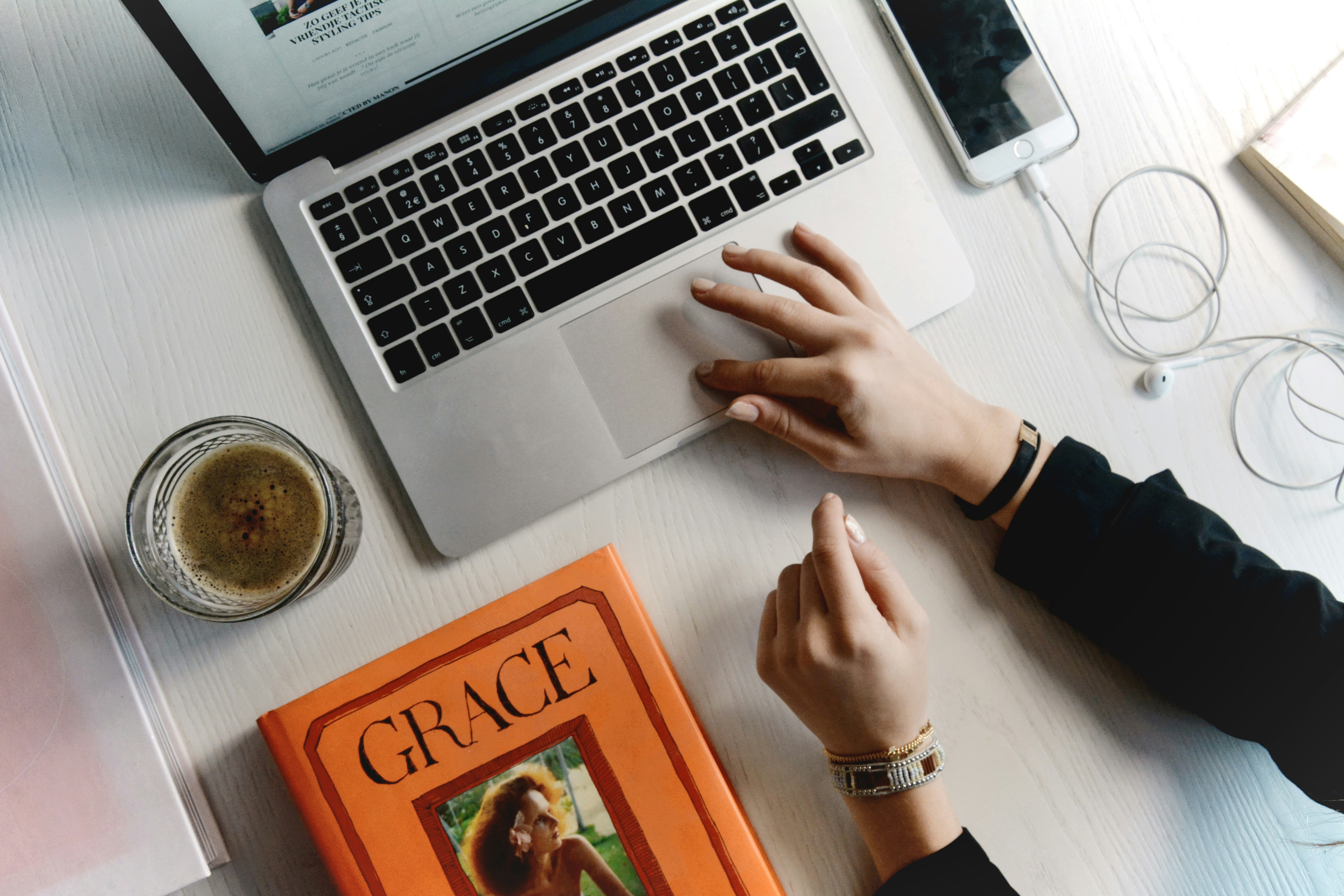 woman using laptop - How To Move Emails To Folders In Gmail