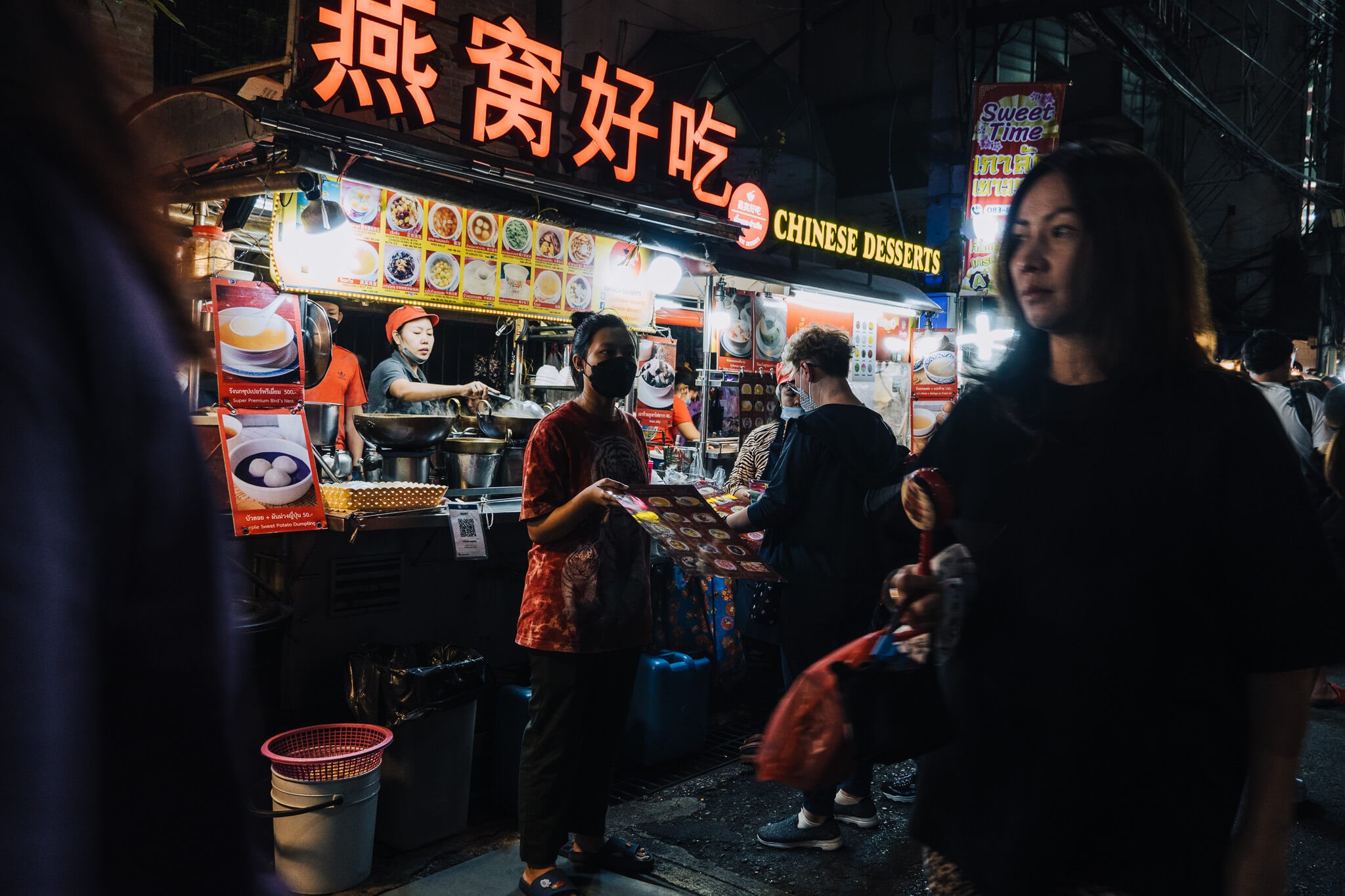 People walking in bangkok's china town at night