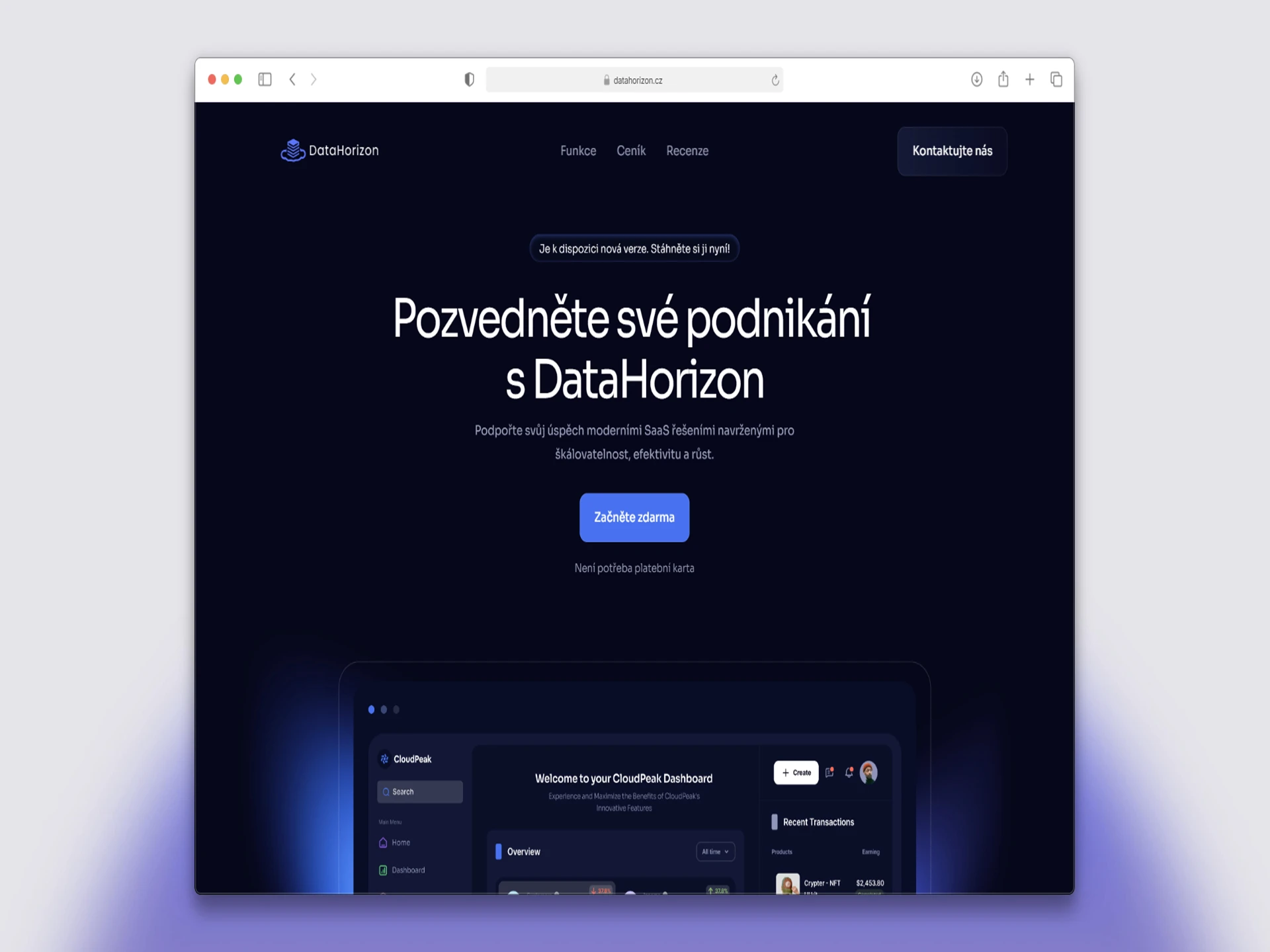 Hikers silhouetted against a clear blue sky at sunset.