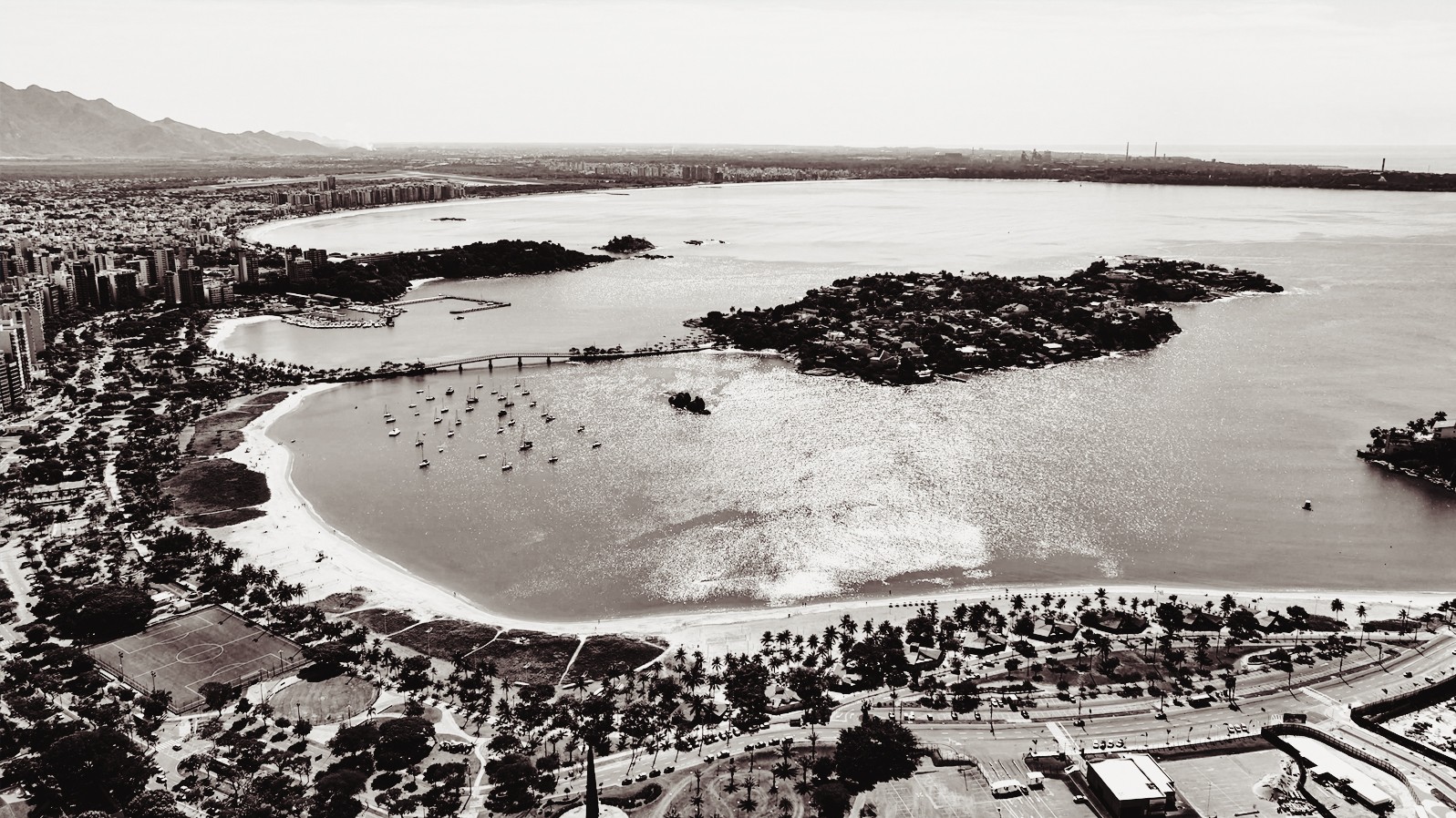 Modern cityscape skyline at sunset.