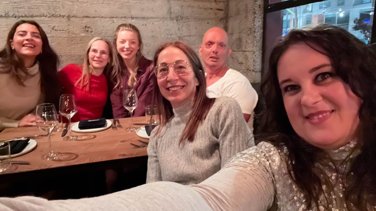 group of 6 people in a restaurant