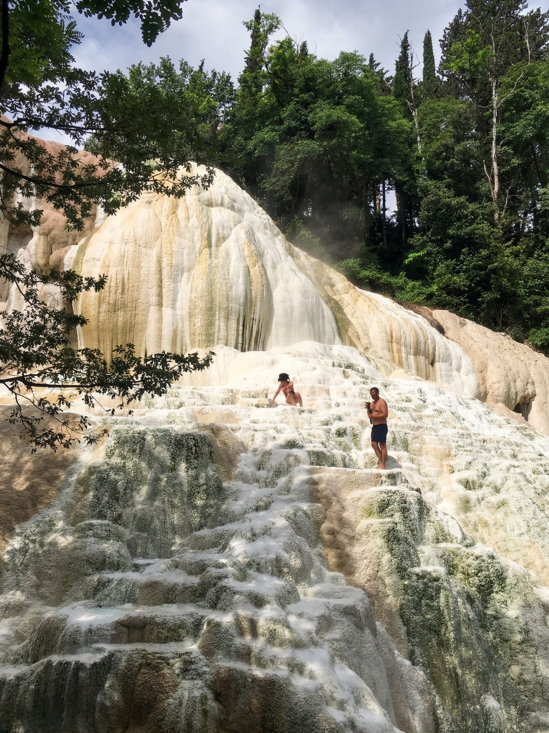 Steaming natural thermal pool at Bagni San Filippo, free hot spring in Tuscany
