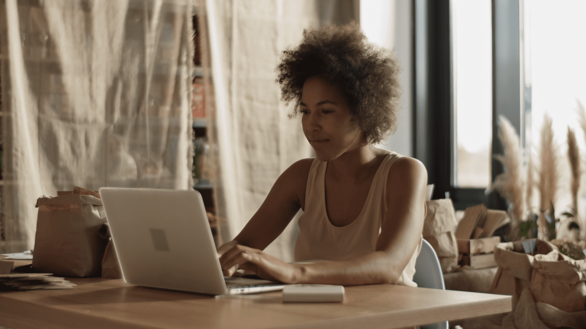 Woman using a computer.