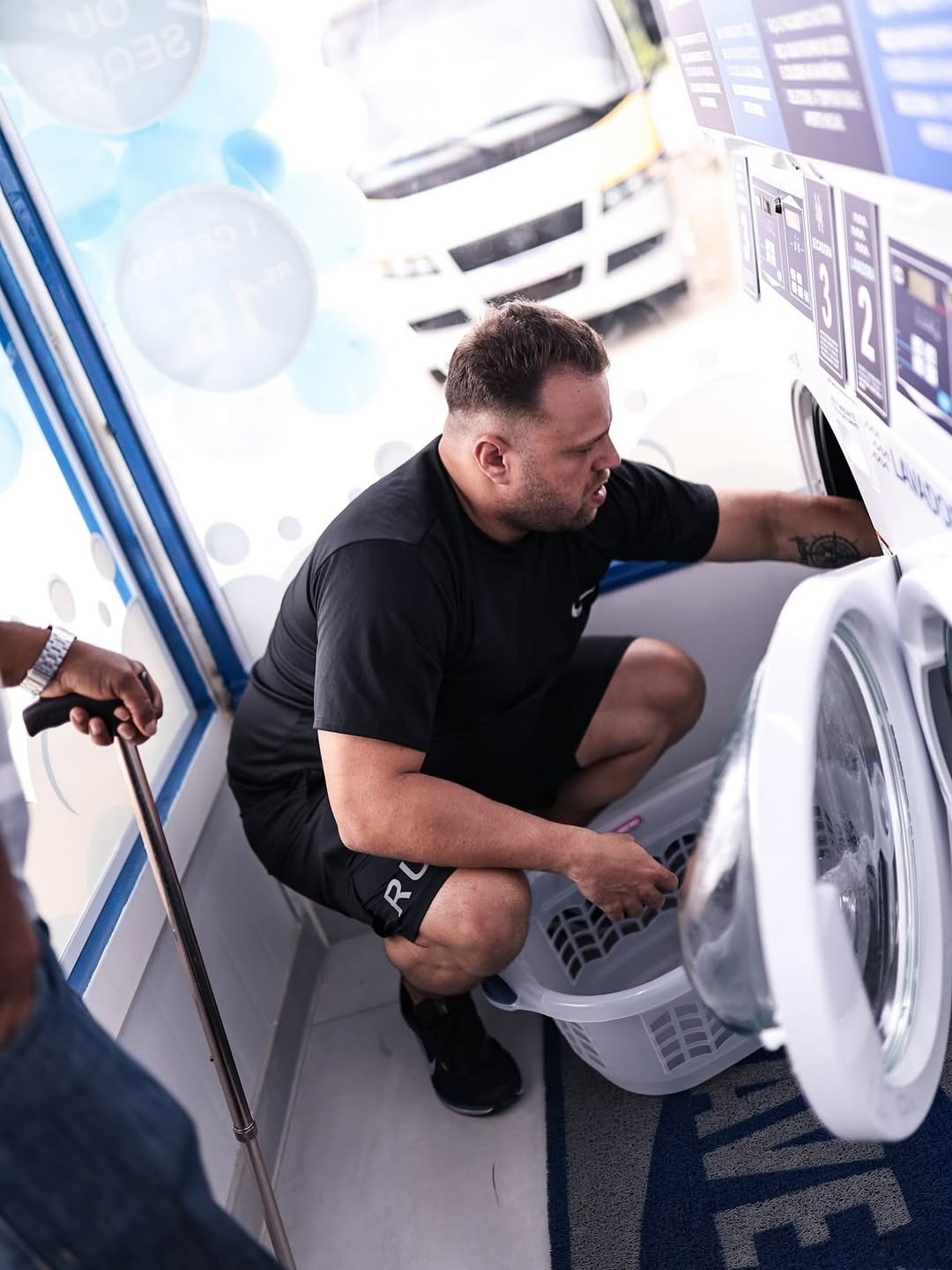 person sitting in a chair in front of a man