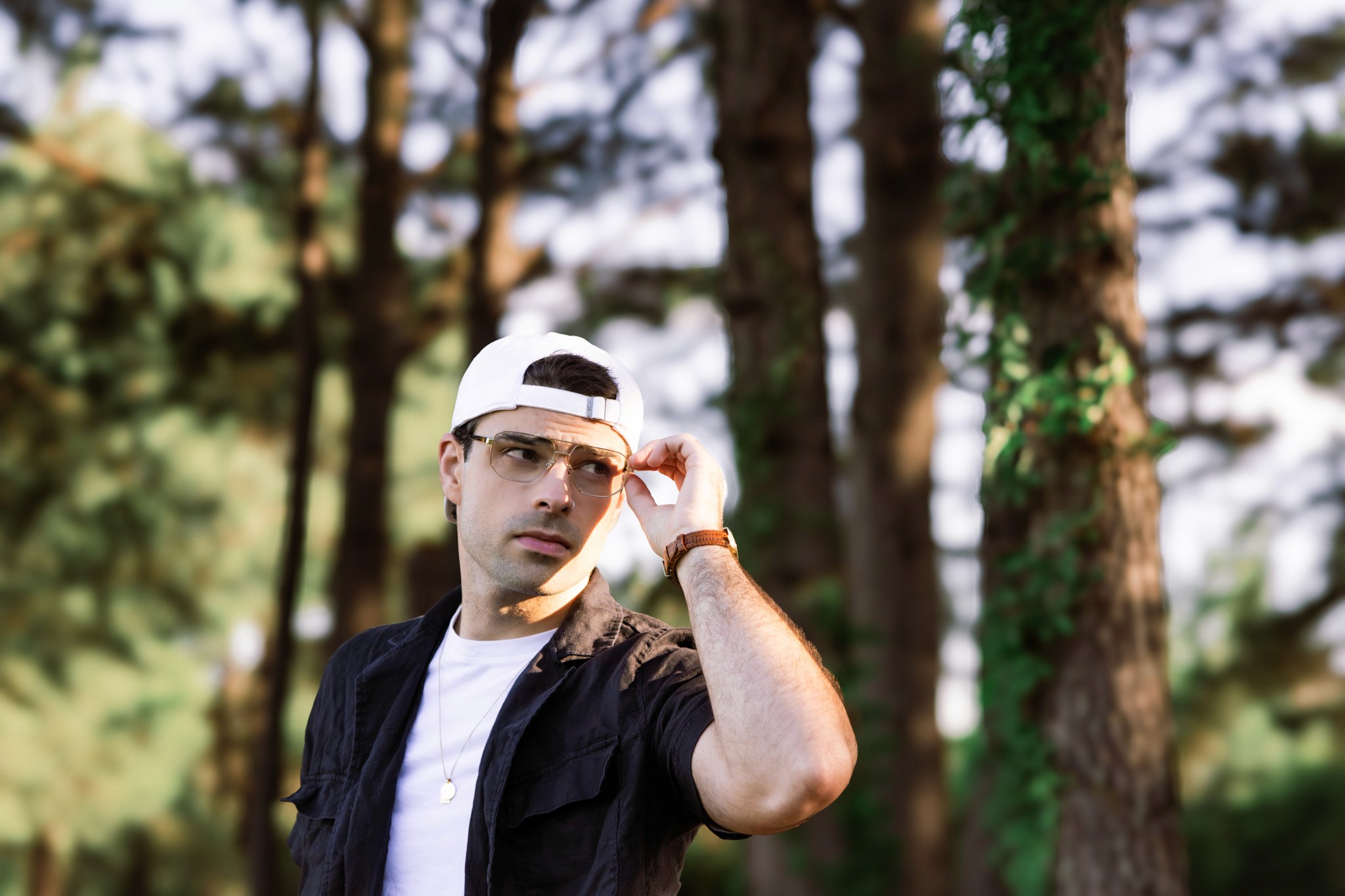 a woman holding a red flower