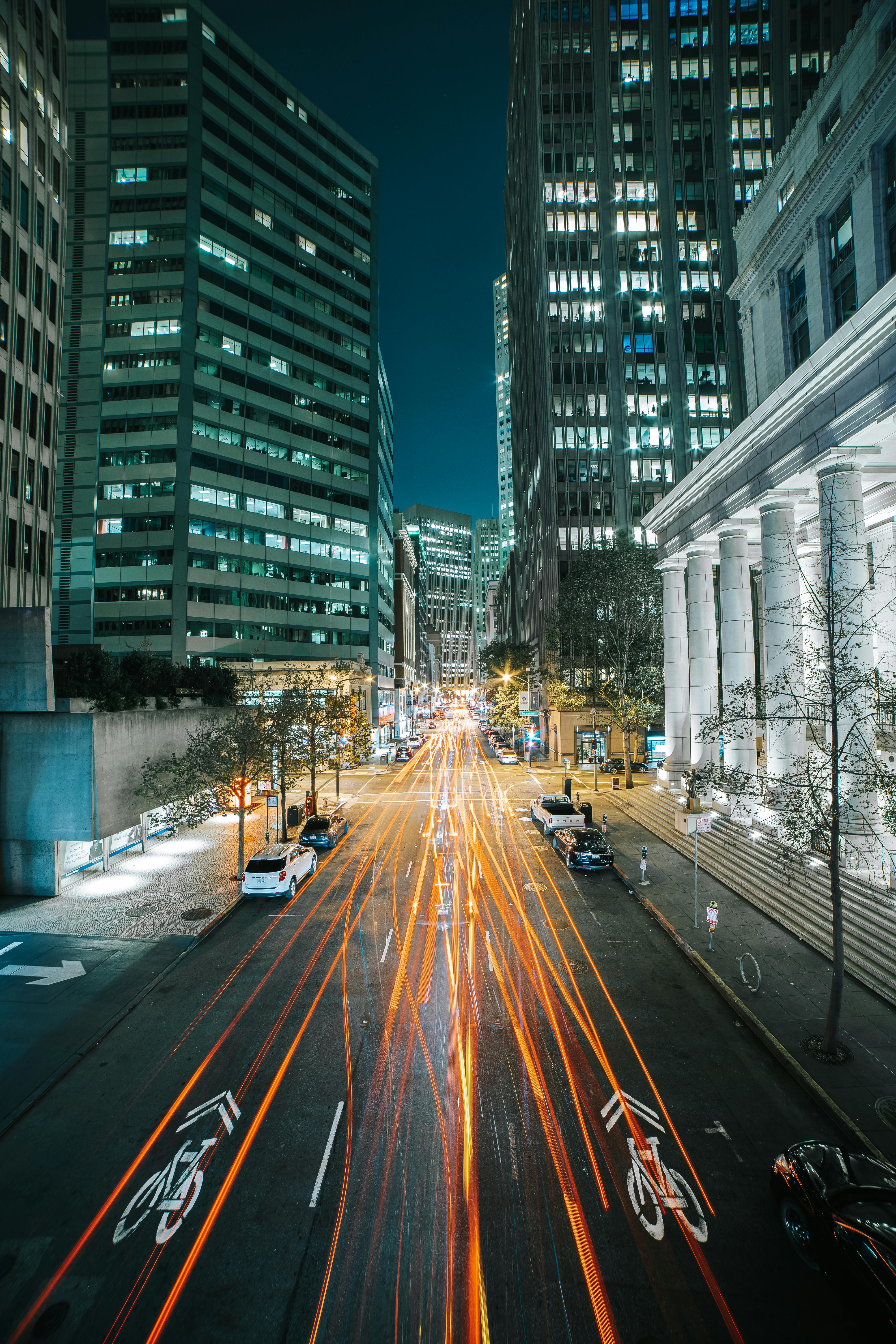 White branded cap with turquoise logo placed on fresh lemons in a red bowl