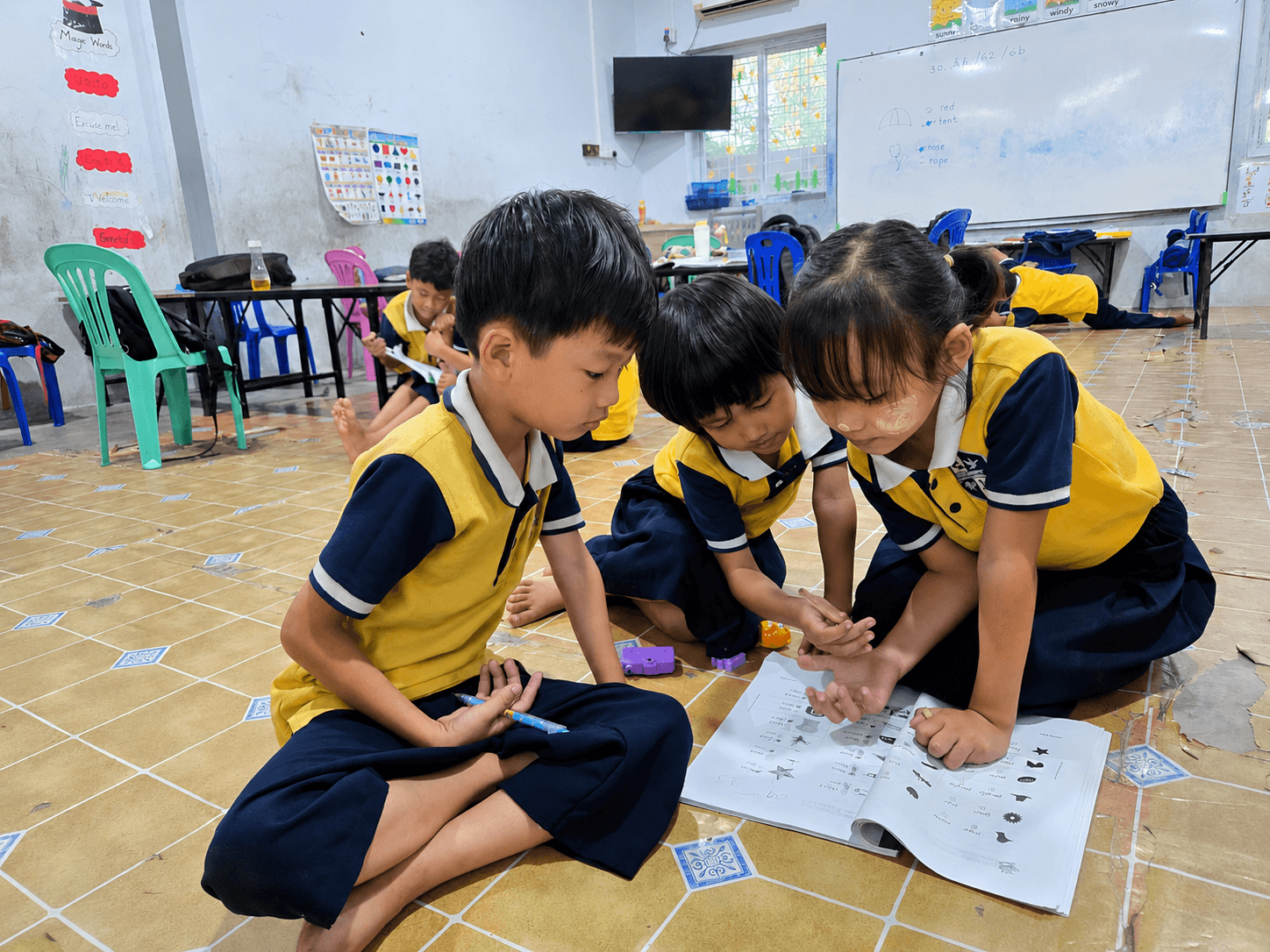Kindergarten students at Elpis International School working together on a classroom learning activity in Yangon, Myanmar