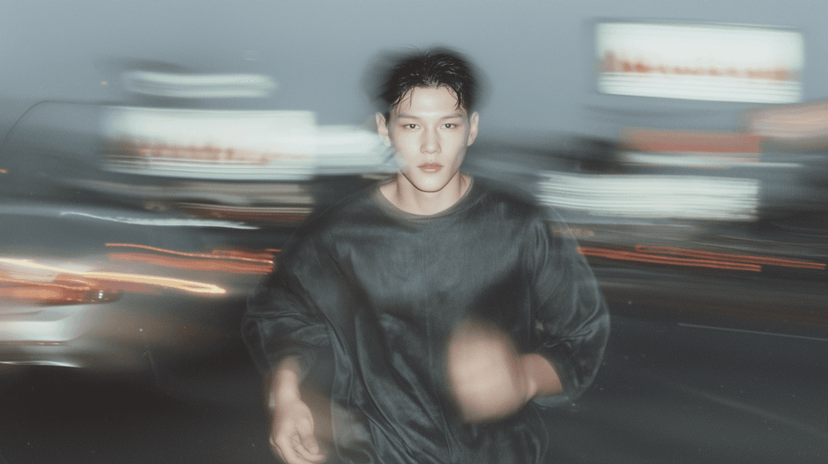 a man running wearing fashionable tshirt