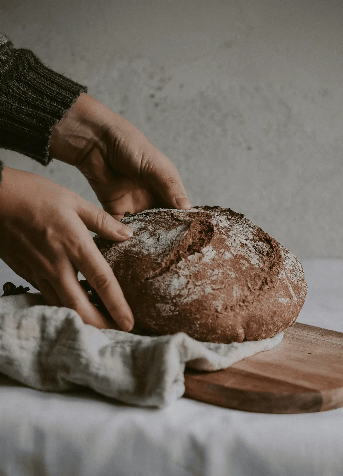 Freshly baked sourdough bread in a bakery basket