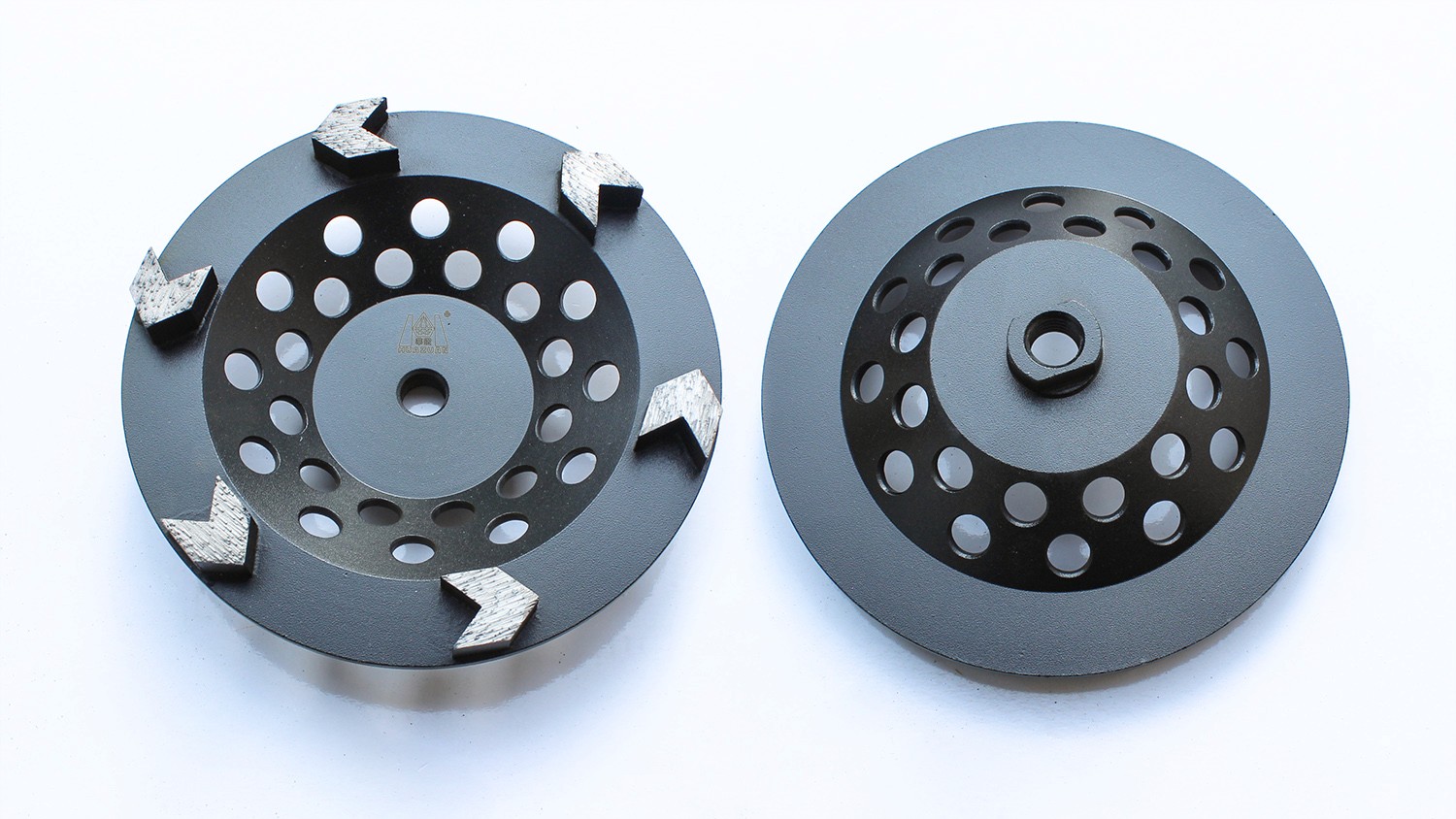 Dual Diamond grinding cup wheels with a unique arrowhead segment design for aggressive grinding of hard surfaces.