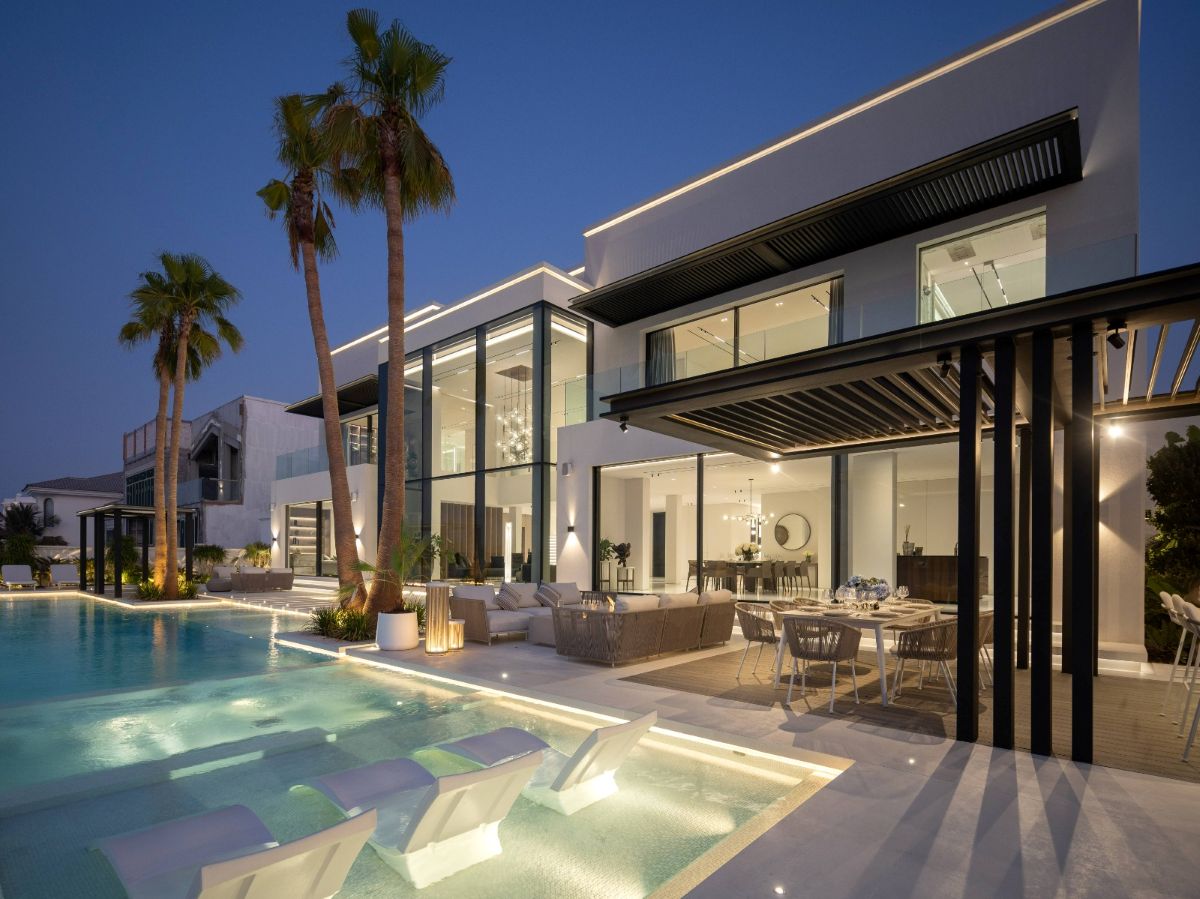 A contemporary home with a terrace and swimming pool