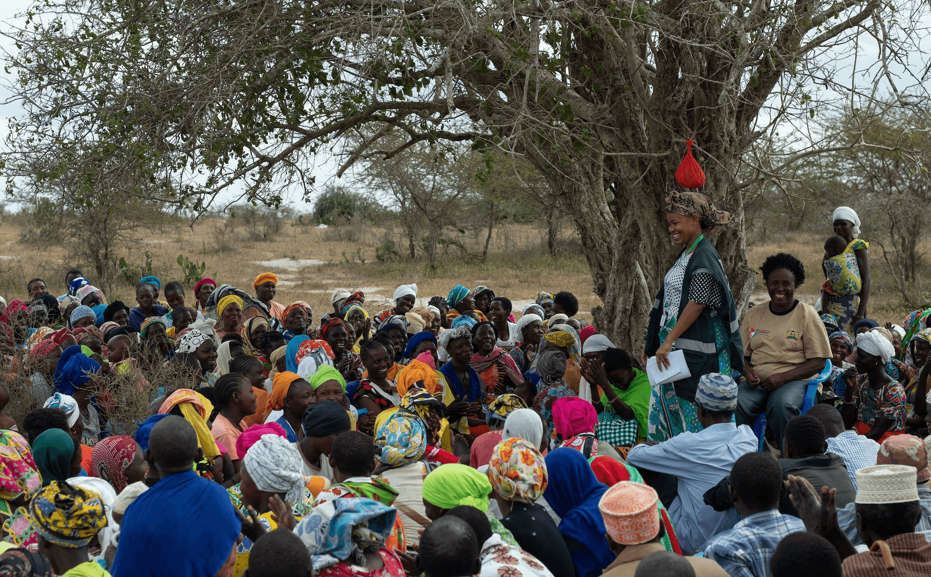 A group of people in a village in Kenya that have been impacted by GiveDirectly.