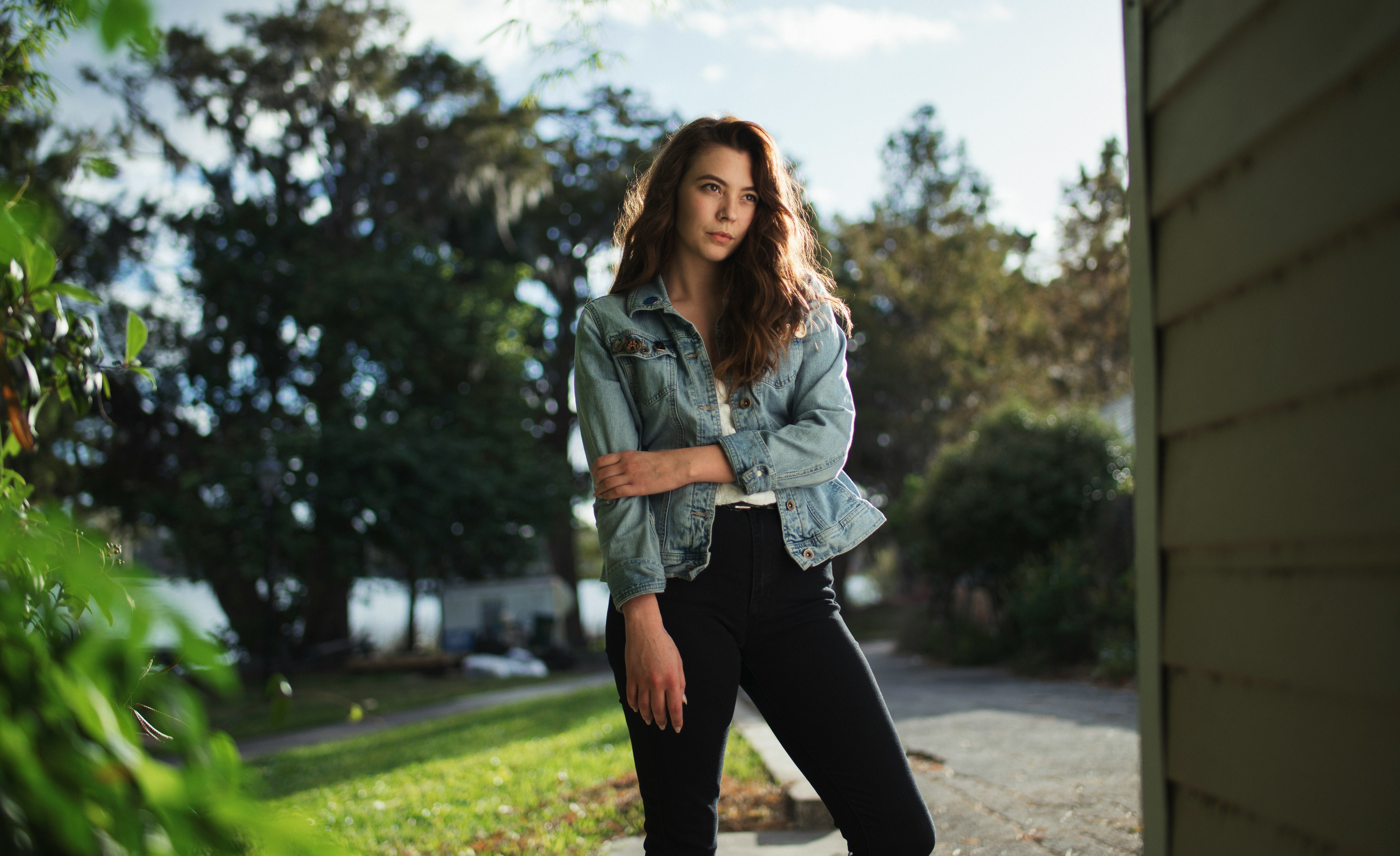 woman posing outside home - Best Colors For Neutral Skin Tone