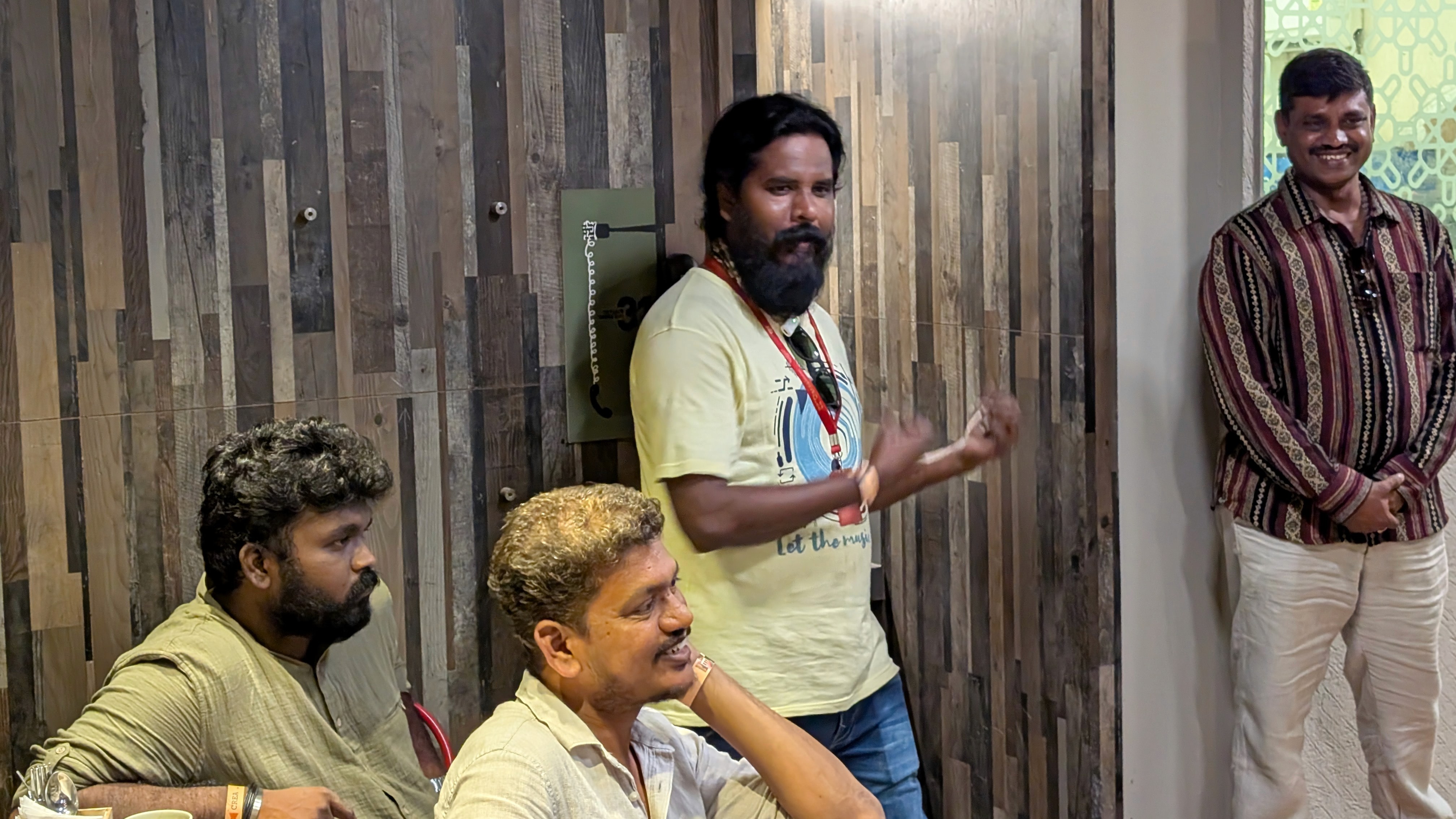 a man holding a microphone in his hands