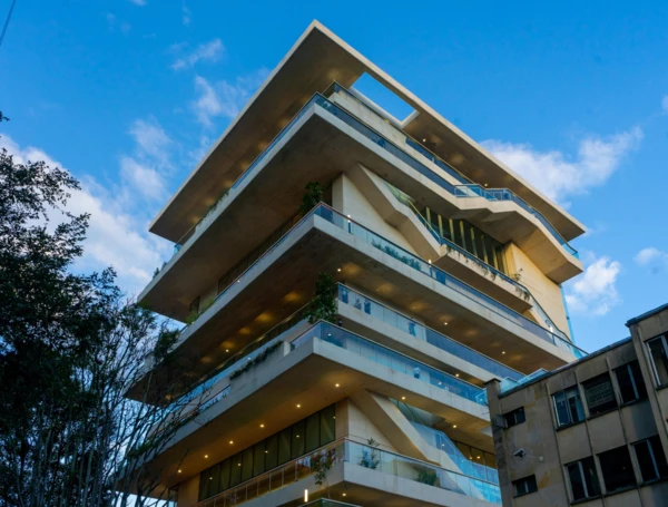 a building with trees and plants