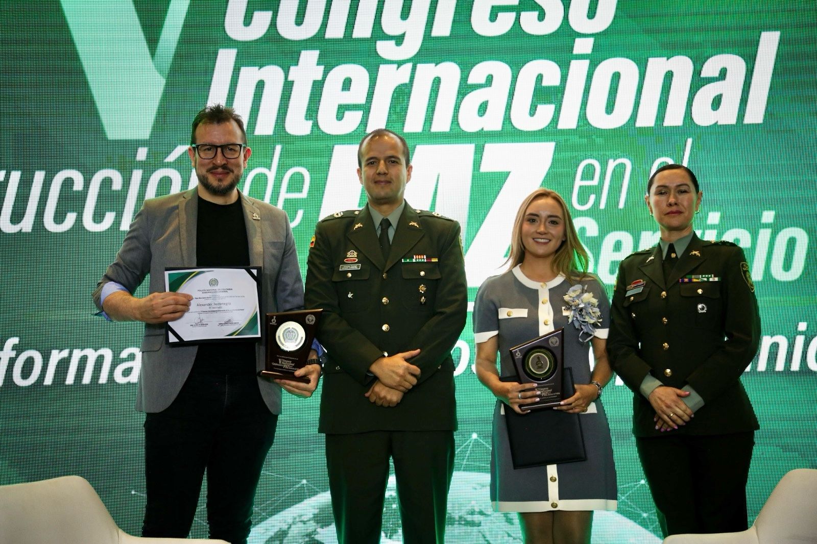 husband and wife working happily on a laptop