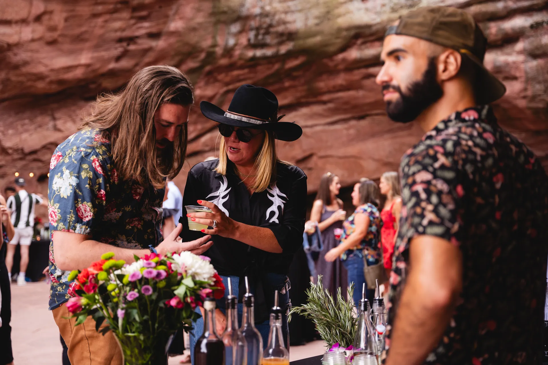 Event guests looking at their cocktail presentation