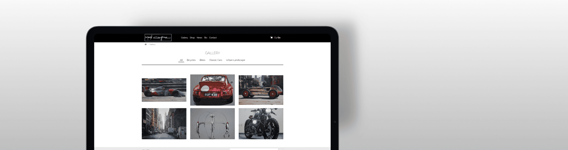 Detailed web interface of MANU CAMPA showcasing artist's portfolio with global exhibitions and brand collaborations.