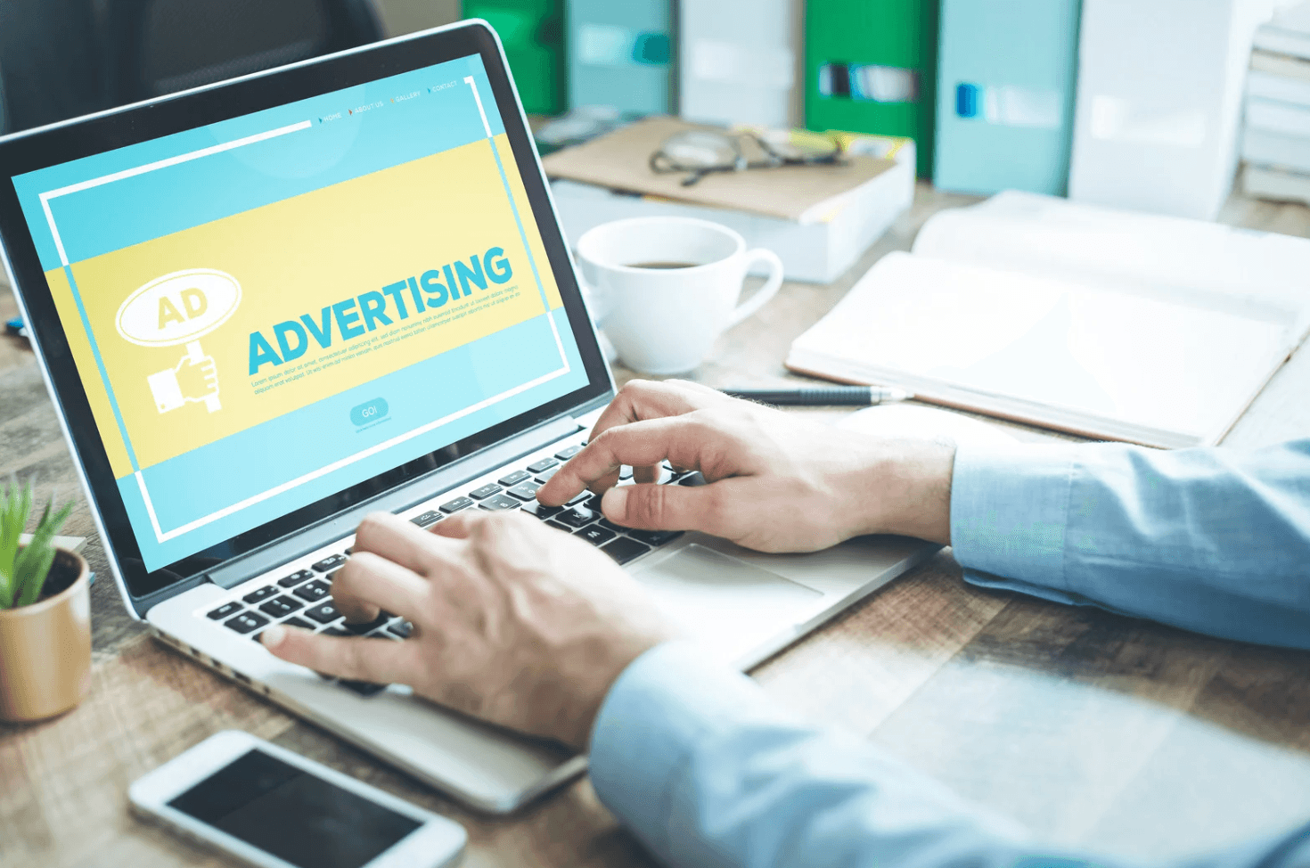 Amazon FBA seller managing automated PPC advertising campaigns on laptop during peak sale season