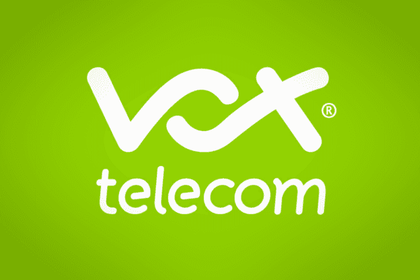 woman in black long sleeve shirt sitting on white couch