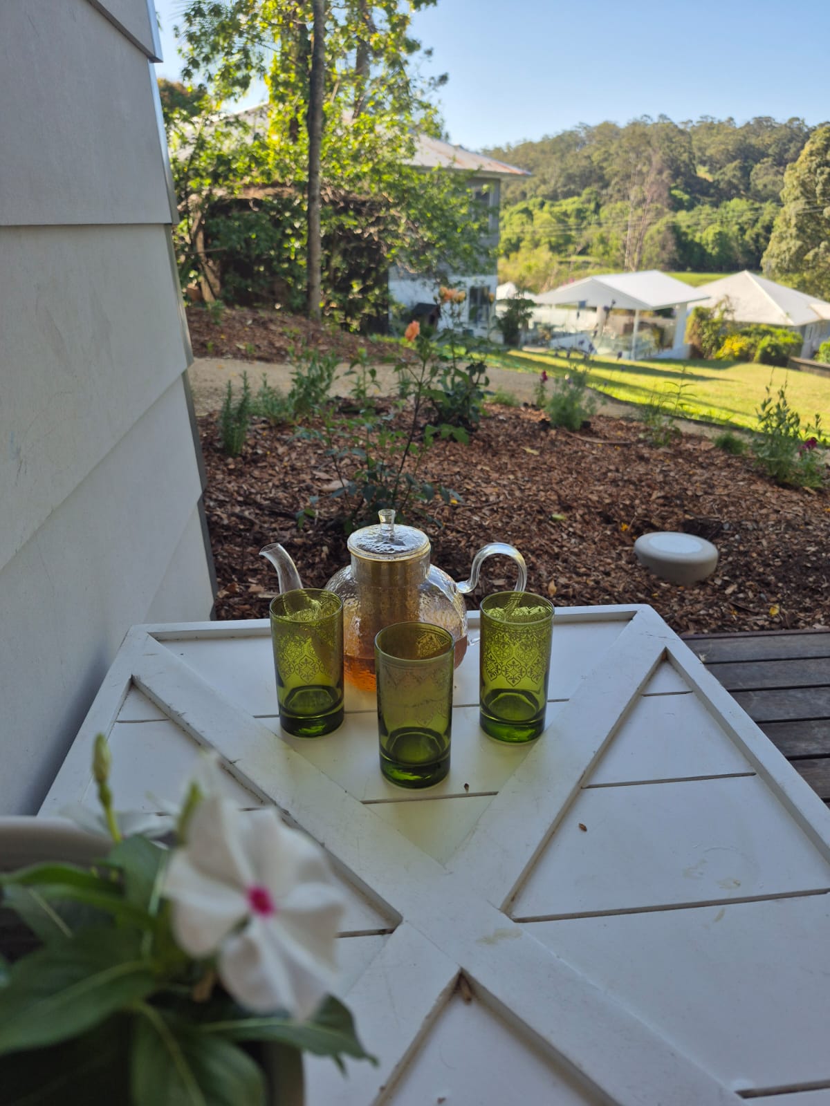 Outdoor seating area at The Honey Homestead, offering tea and relaxation after Pilates classes.