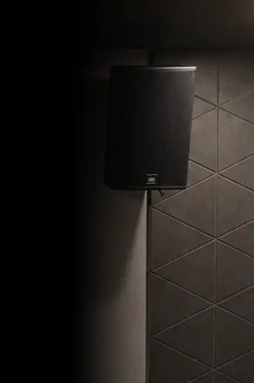 Commercial presentation display with wall-mounted audio speaker