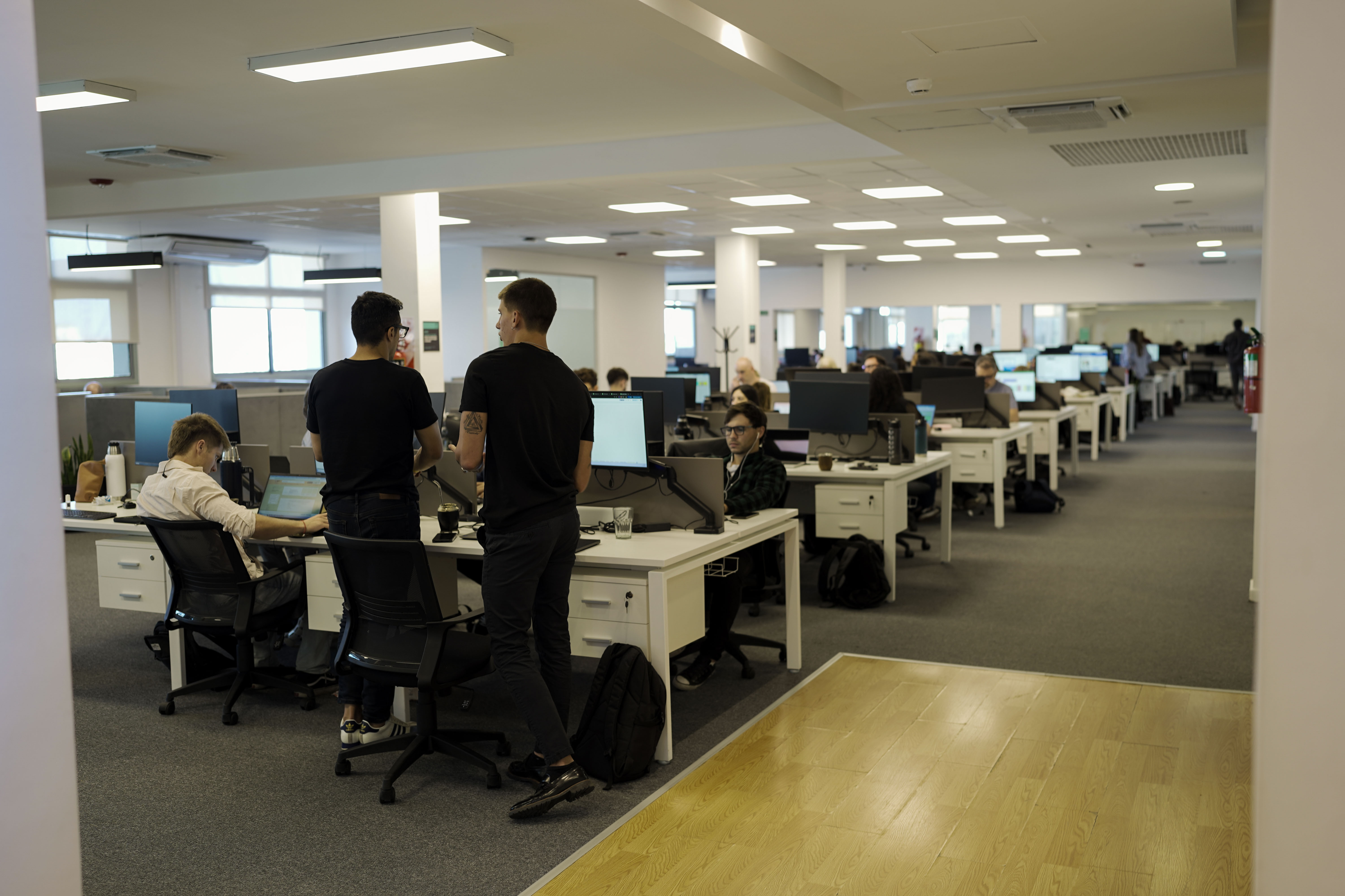 people sitting on chair near glass window during daytime