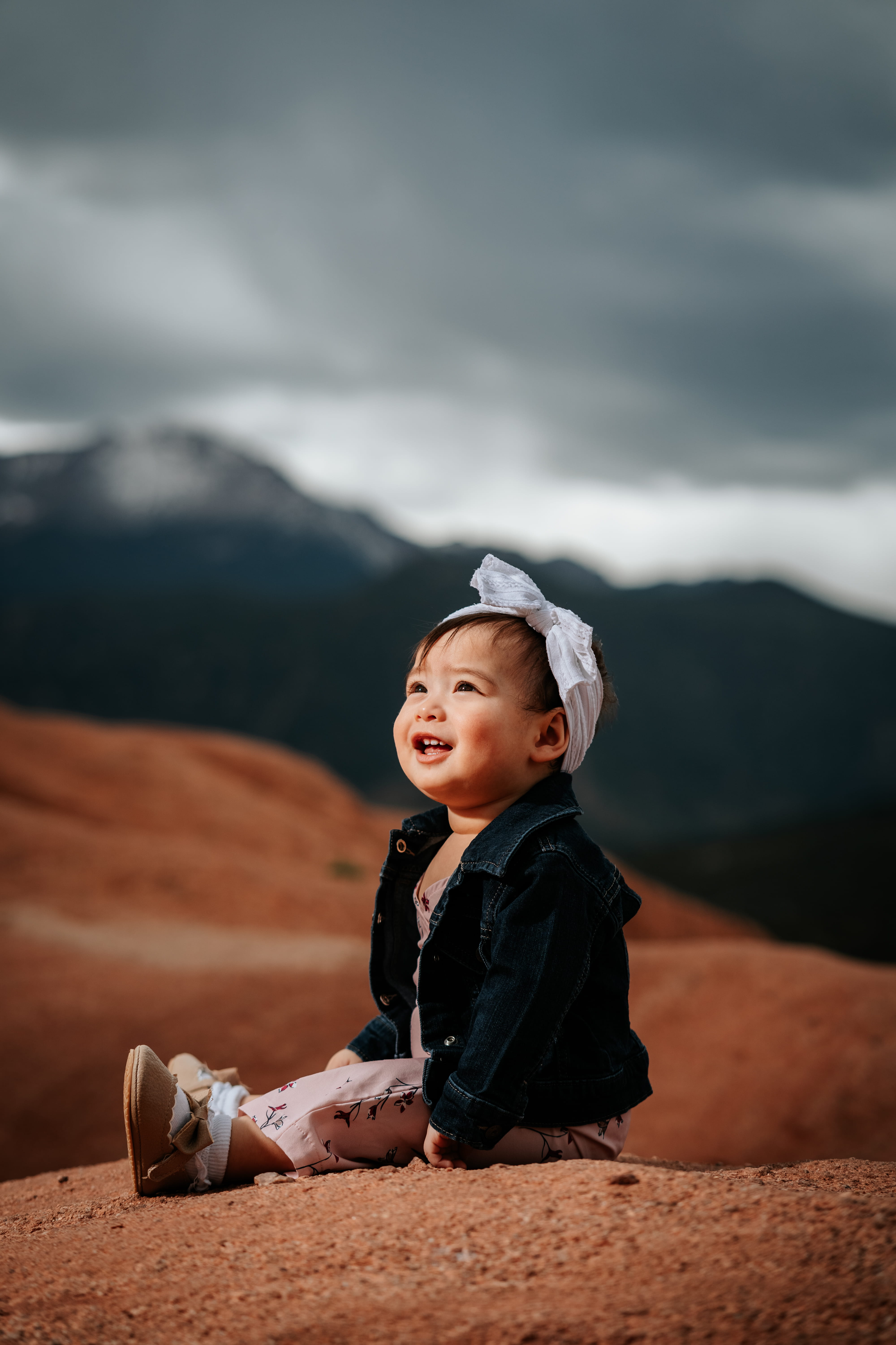 A beautifully decorated wedding cake featuring red and white roses.