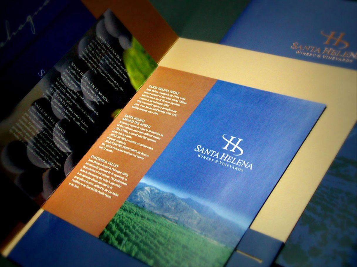 Rooftops of a coastal town with the sea in background